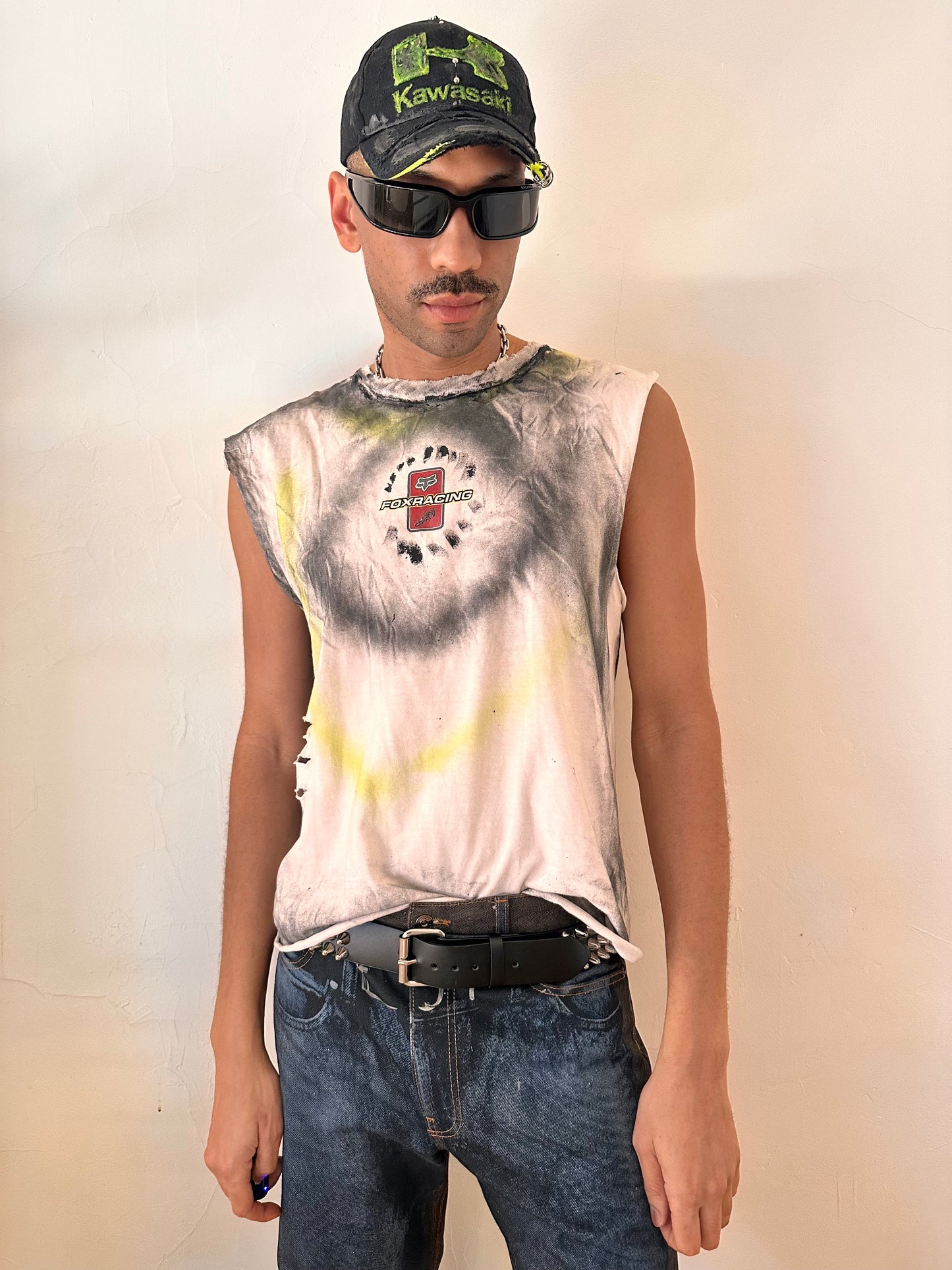 Male model wearing ASTROBOI* x Fox Racing white airbrushed motocross tank top, styled full look, ASTROBOI* STUDIO NYC.