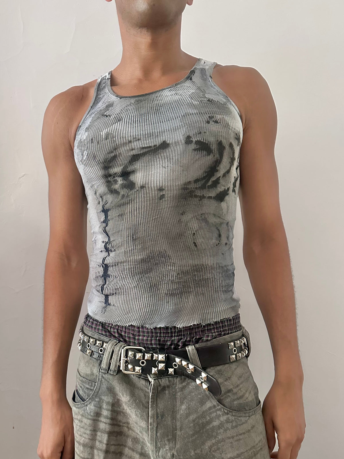 Male model wearing ASTROBOI* x Hanes 'DRAUGR.exe' black and white faded barbed wire grunge tank top, styled full look, ASTROBOI* STUDIO NYC.