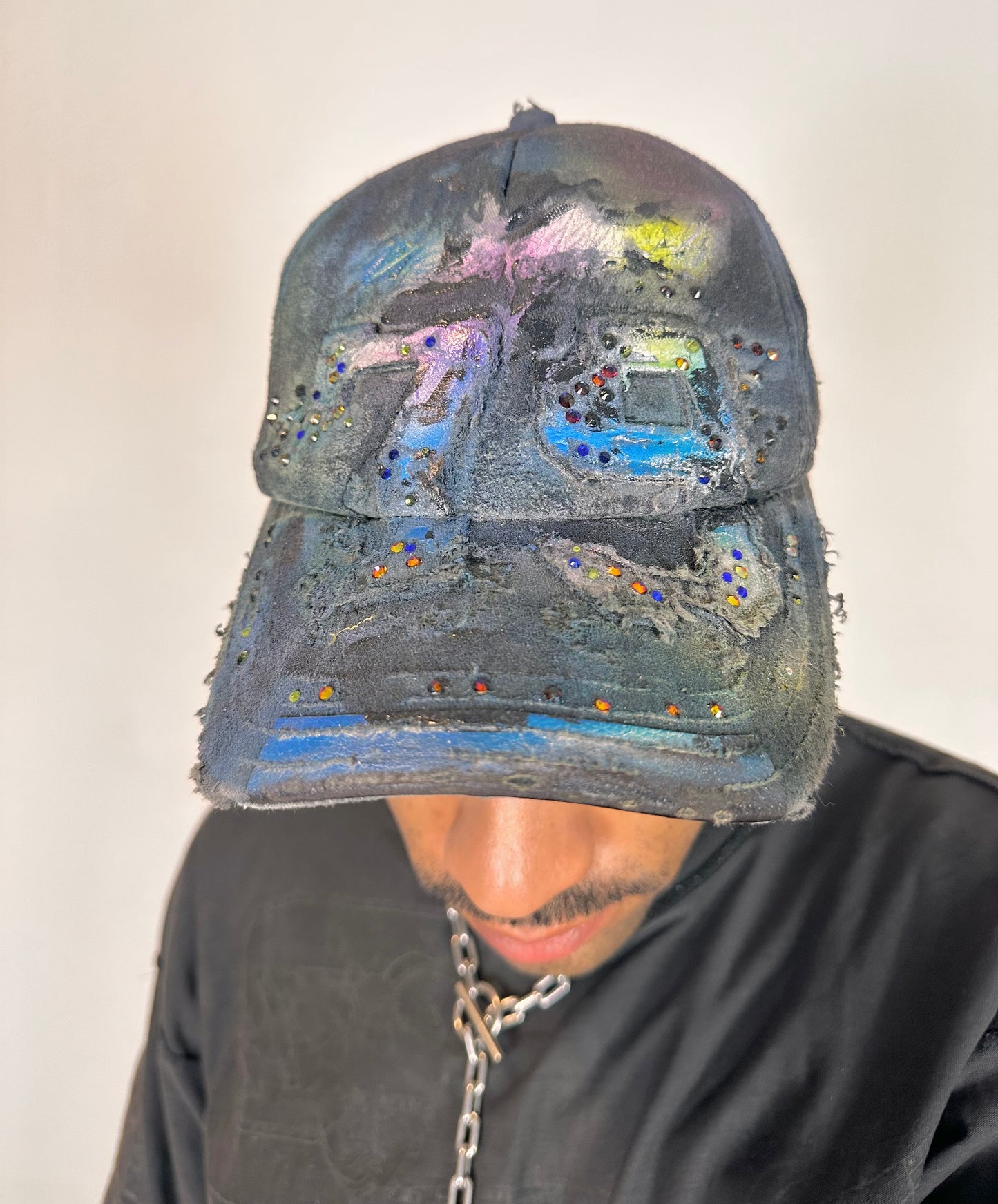 Front of ASTROBOI* blue rainbow tropical Y2K hat with multicolored rhinestones, hand-painted shading, and adjustable strap back