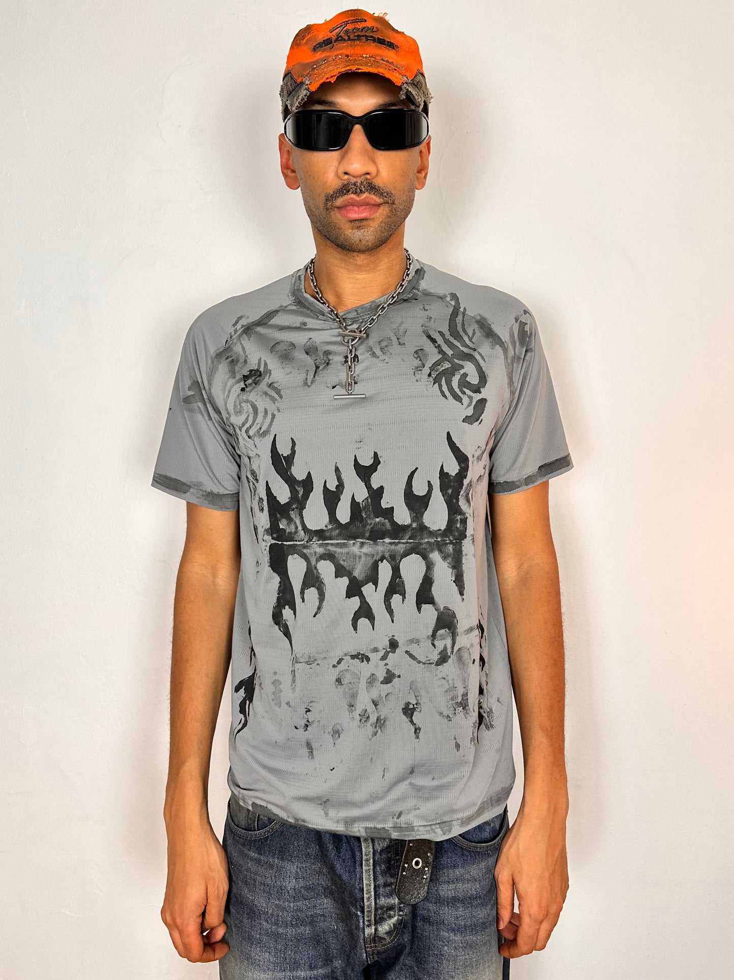 Styled image of ASTROBOI* Flames grey and black tattoo print compression top with moisture-wicking sports fabric and tight fit, size Large