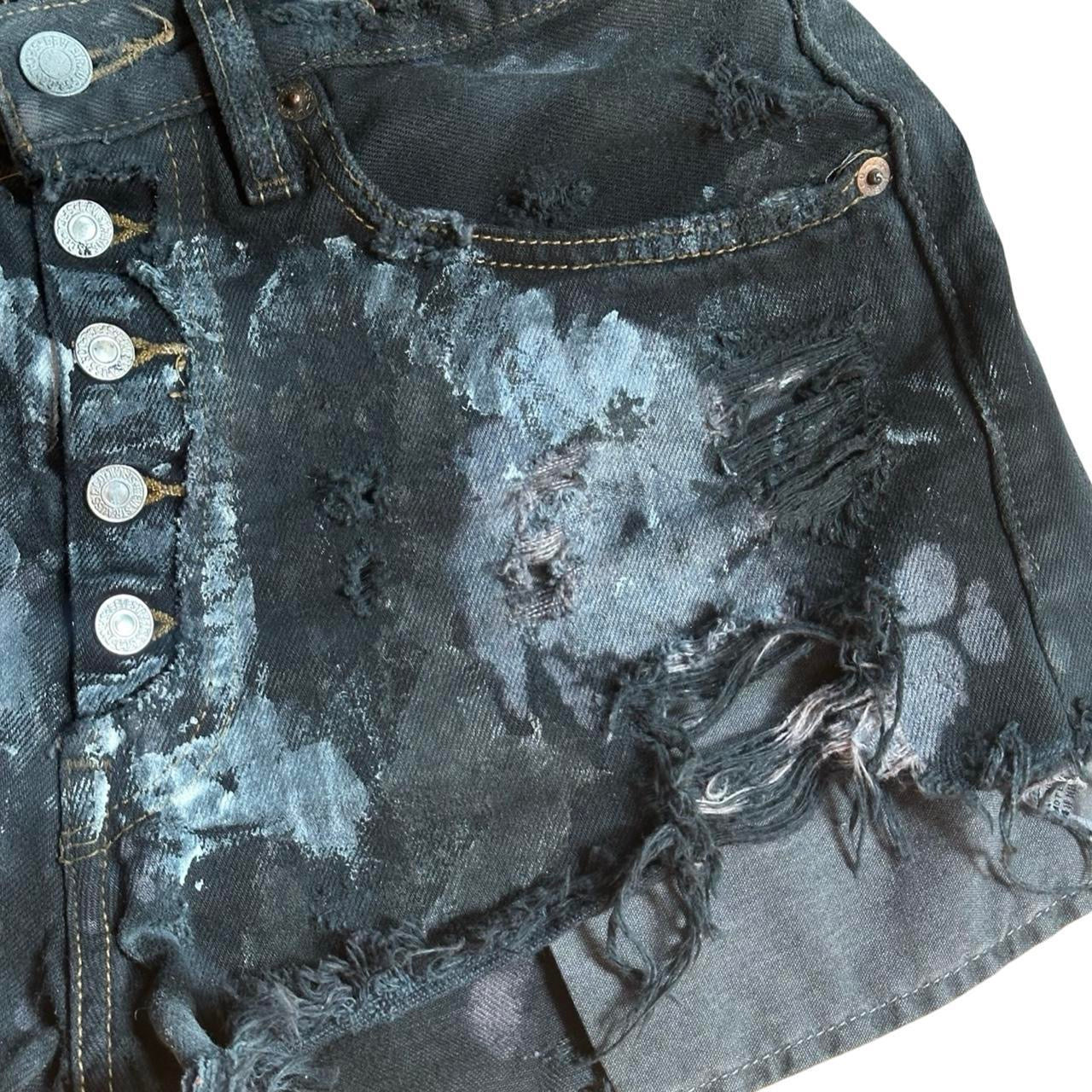 ASTROBOI* x Levi's Womens Ripped Black Denim Painted Mini Shorts - flat front right