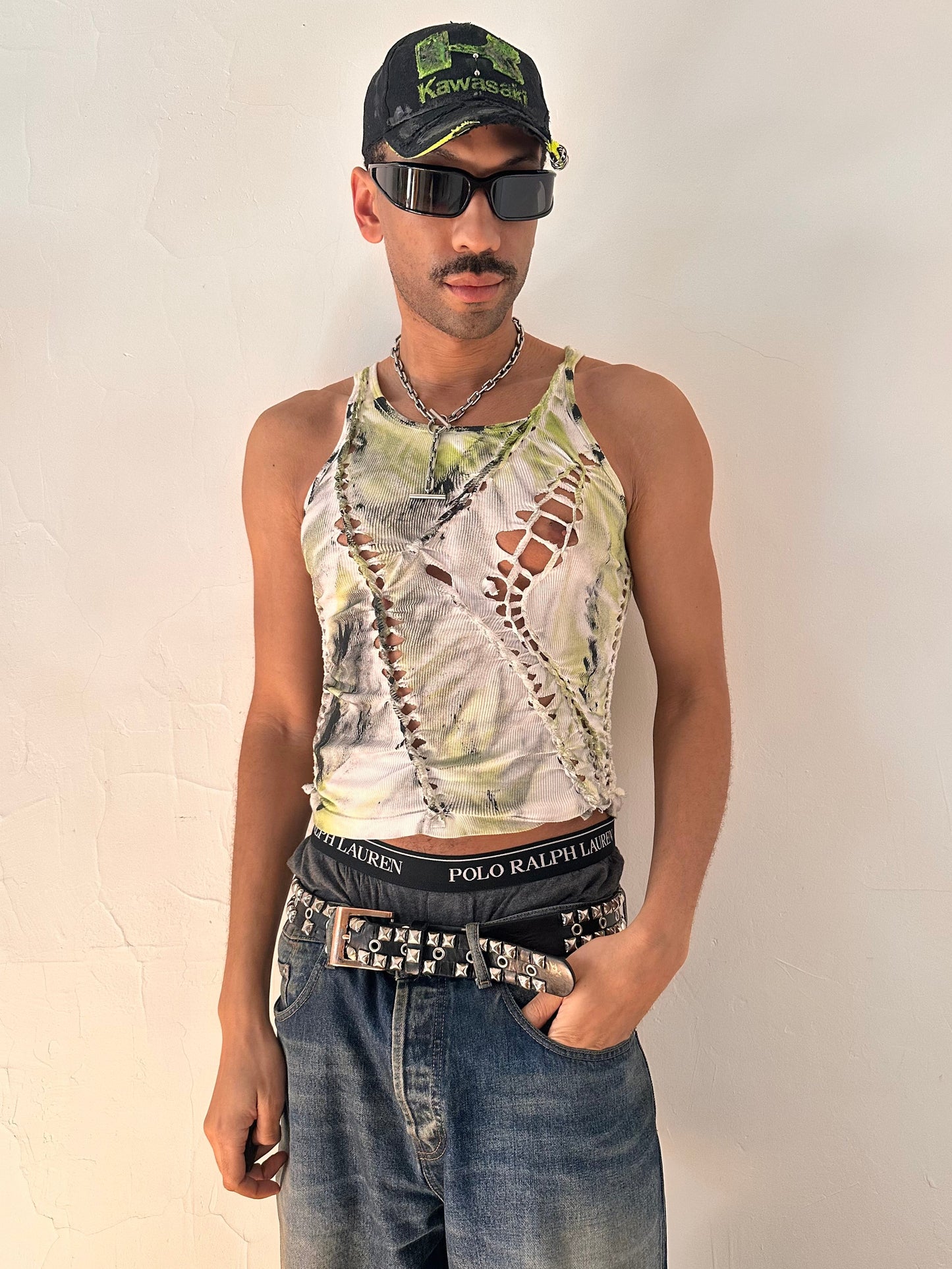 Male model wearing ASTROBOI* x Calvin Klein 'Brat' white braided twist tank top, styled full look, ASTROBOI* STUDIO NYC.