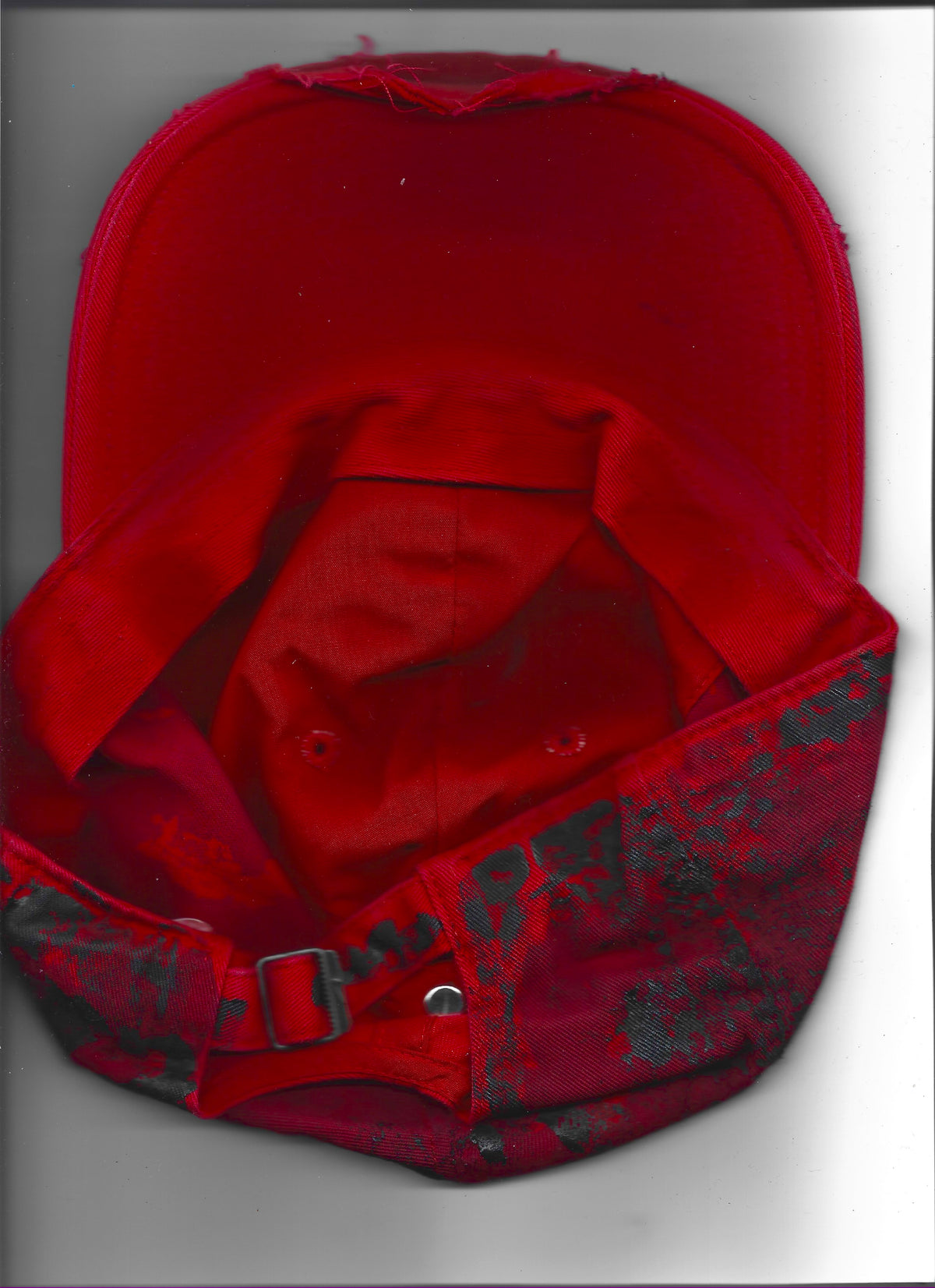 ASTROBOI* x Nike 'Comet' red and black painted distressed rhinestone hat, rear view showing back scanned image.