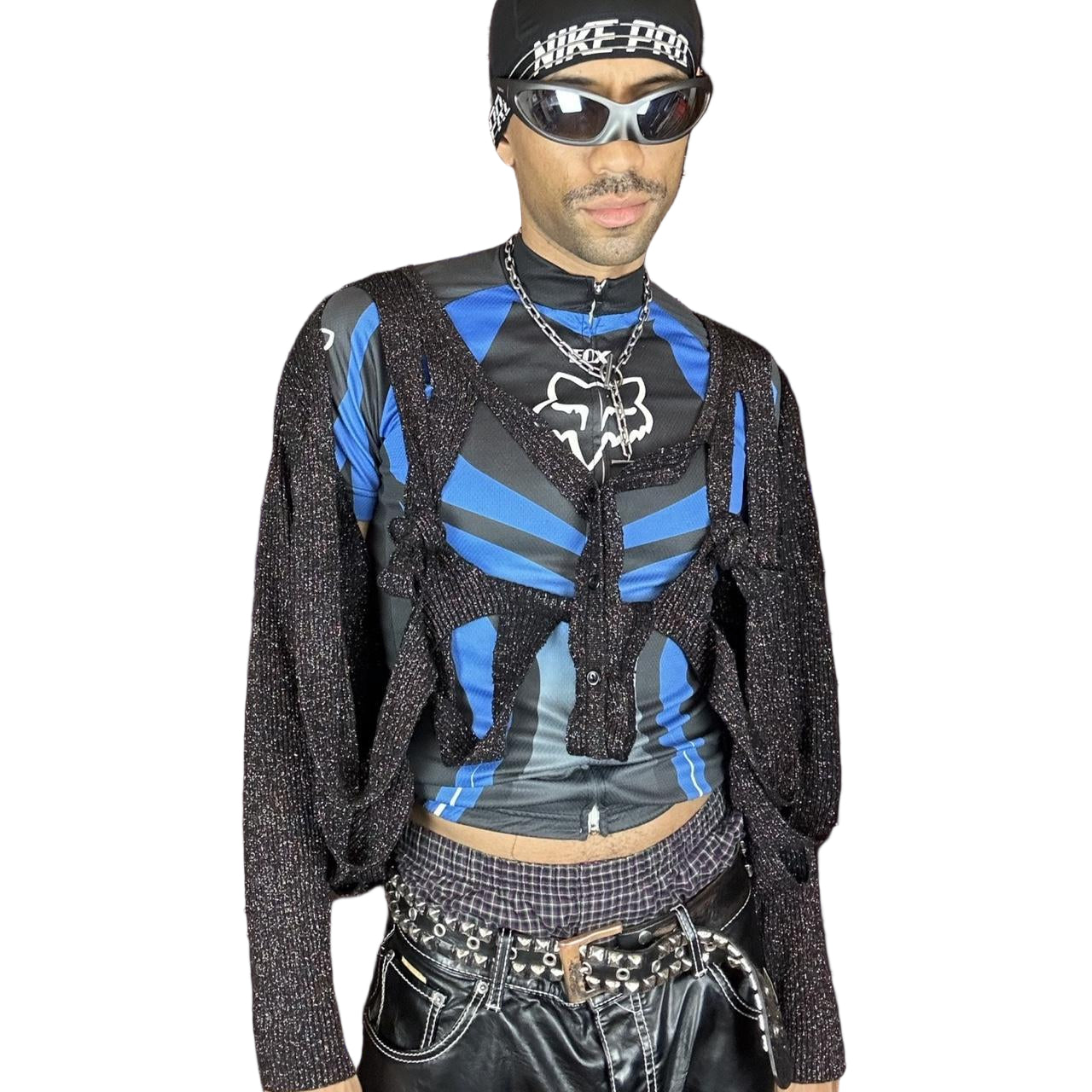 Styled view of ASTROBOI* black modular rainbow lurex cardigan with cut outs, shimmer finish, and adjustable hanging straps for custom knot styling. Handmade in Brooklyn.