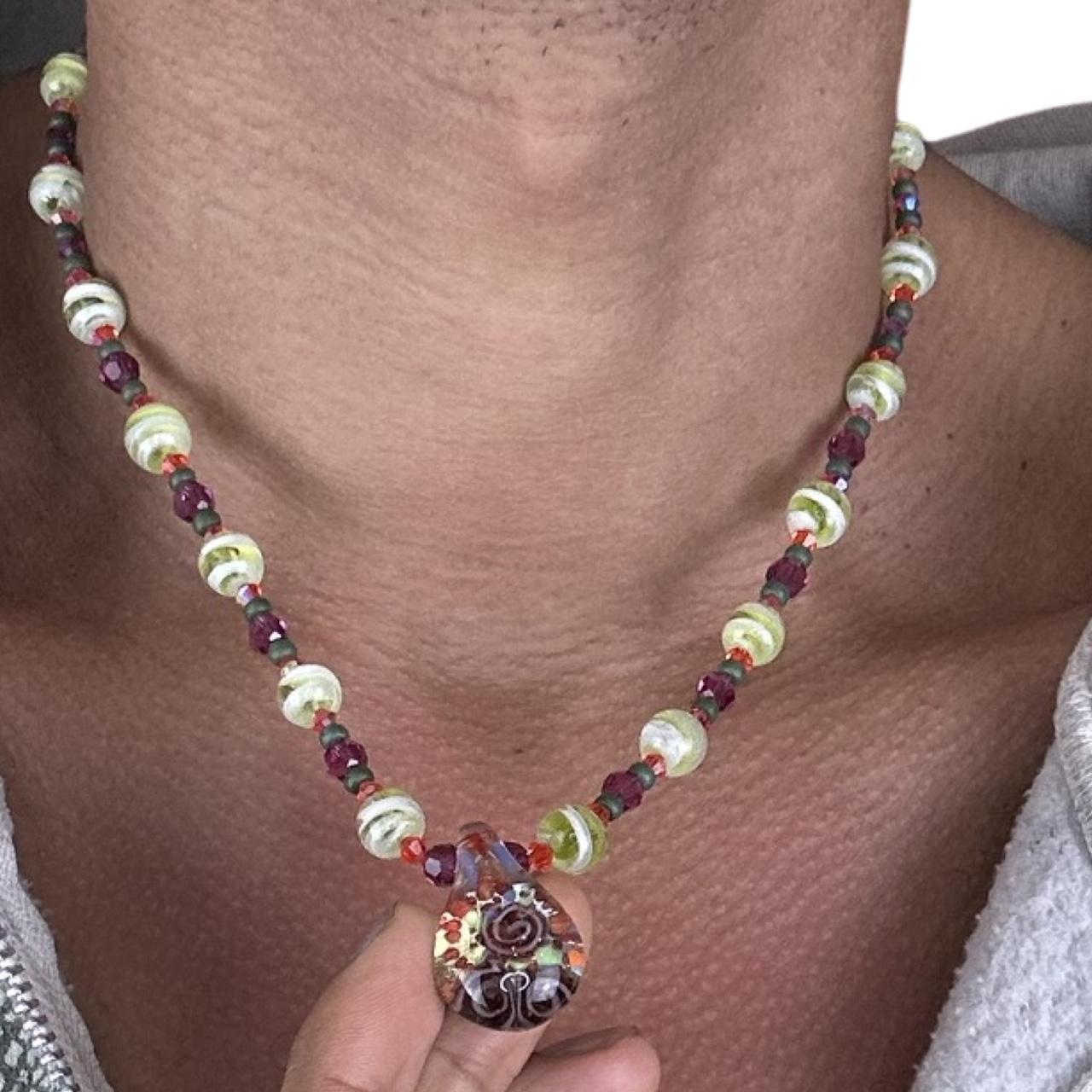 MULTICOLORED GLASS BEADED NECKLACE WITH FLORAL PENDANT