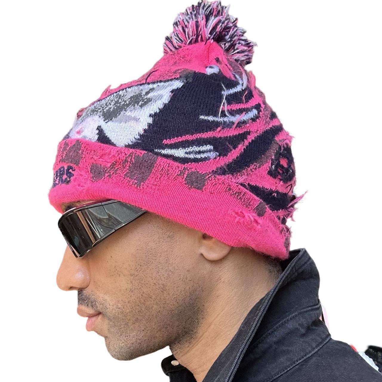 ASTROBOI* 'VOYAGER' Pink Distressed Swan Pom Pom Beanie, left
