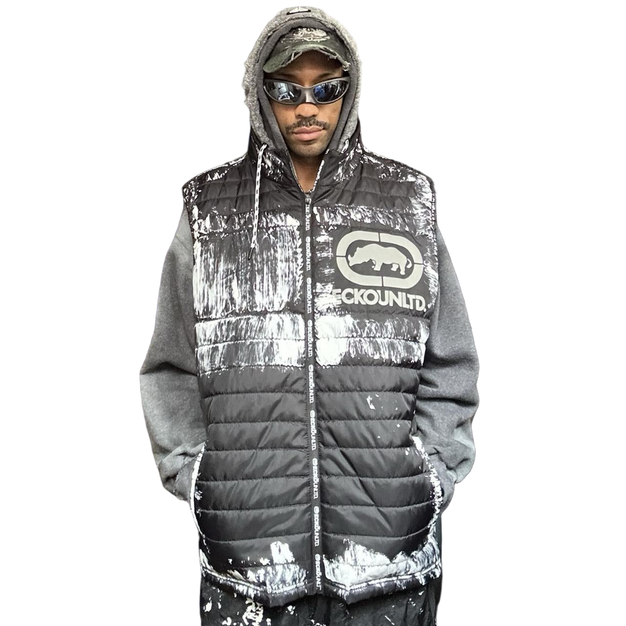 ASTROBOI* x Ecko Unltd black painted puffer vest with oversized gray hood, reflective logo, and white paint-stroke detailing. Custom streetwear made in NYC. Styled