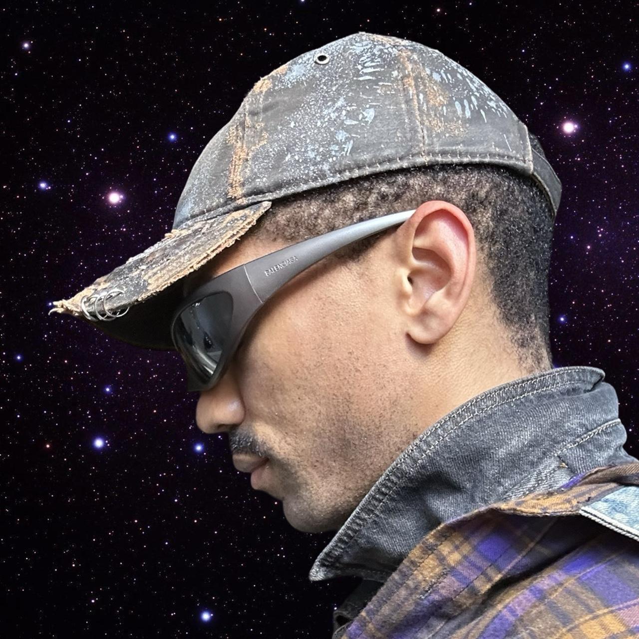 ASTROBOI* Paint Splatter & Pierced Brown Leather Resin Hat , left