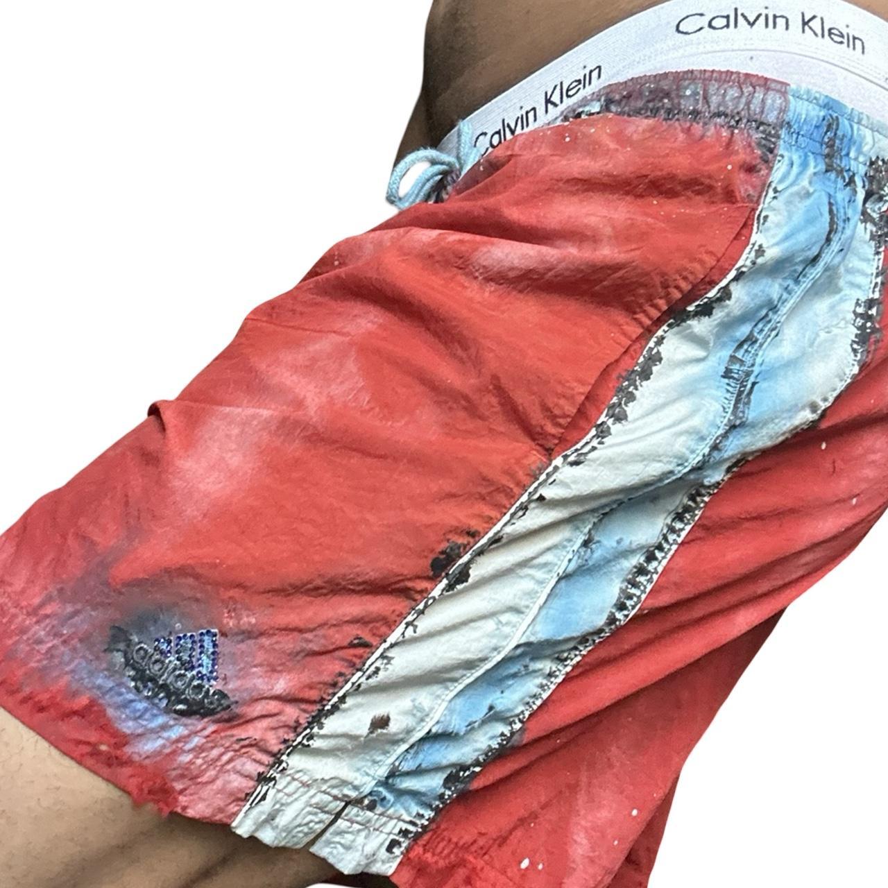 ASTROBOI* x Adidas Orange Nylon Rhinestone Grunge Shorts - left detail