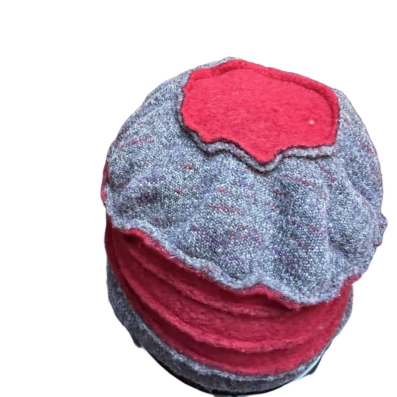 Top of ASTROBOI* red and grey pleated beanie with slouchy fit and patchwork panels, handmade in NYC.