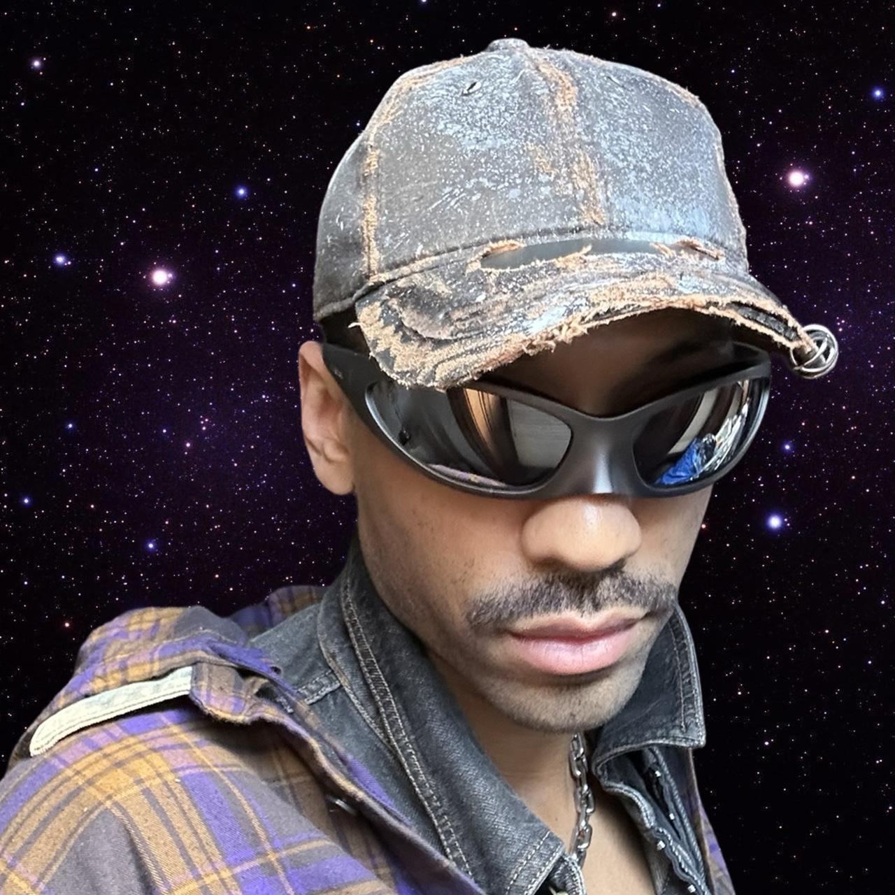 ASTROBOI* Paint Splatter & Pierced Brown Leather Resin Hat , front left center