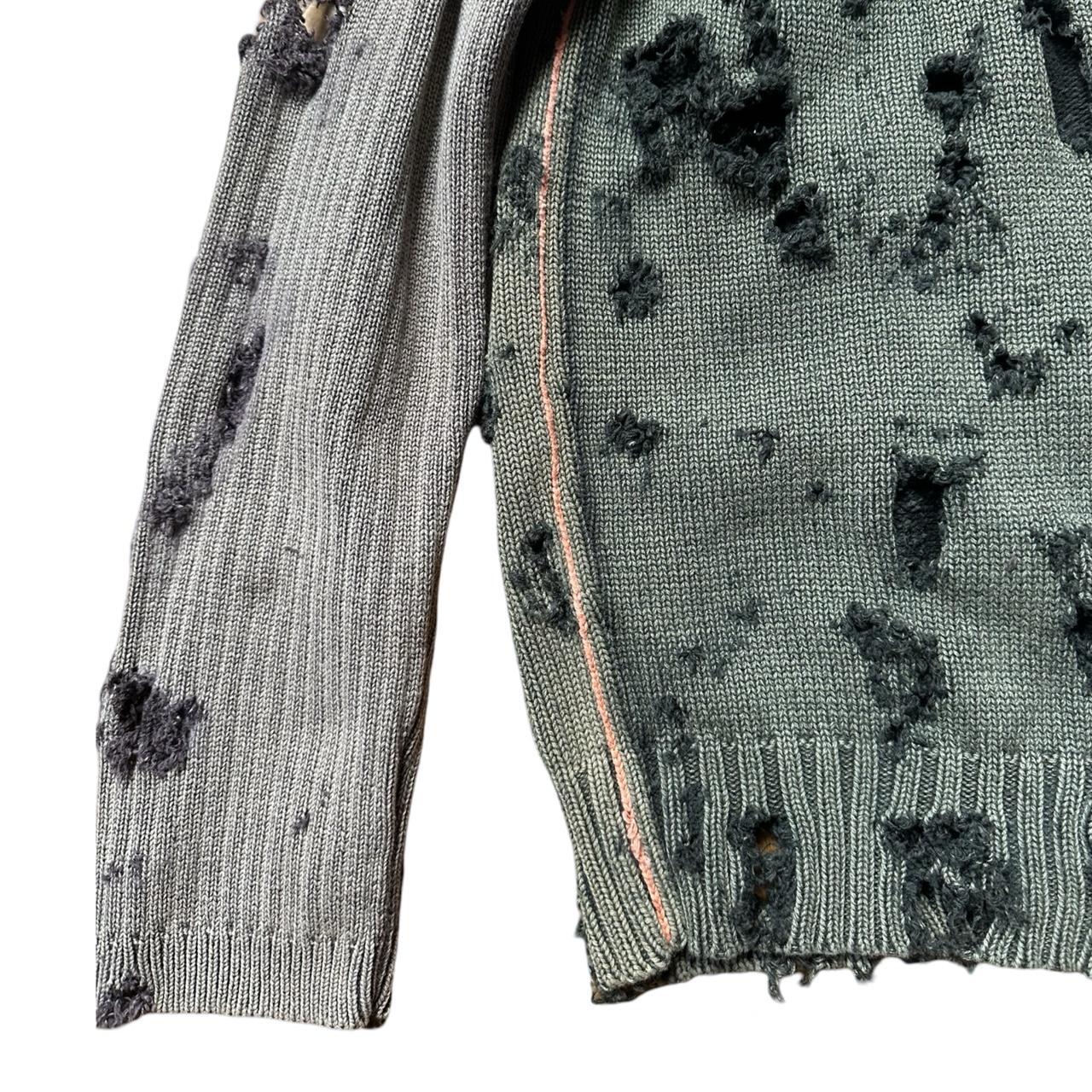 ASTROBOI* khaki and tan ribbed grunge zip-up sweater with distressed holes, contrast sleeves, and orange piping. One-of-a-kind custom piece made in NYC. Flat lay close up of holes.