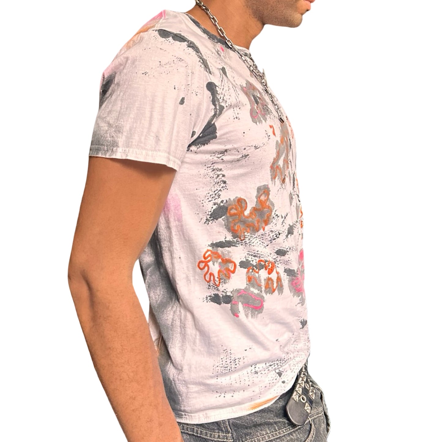 Person wearing a floral patterned t-shirt on a white background