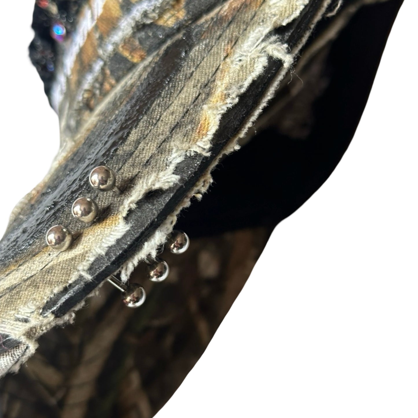 ASTROBOI* 'DSG' Brown Camouflage Pierced Rhinestone Hat - piercing detail
