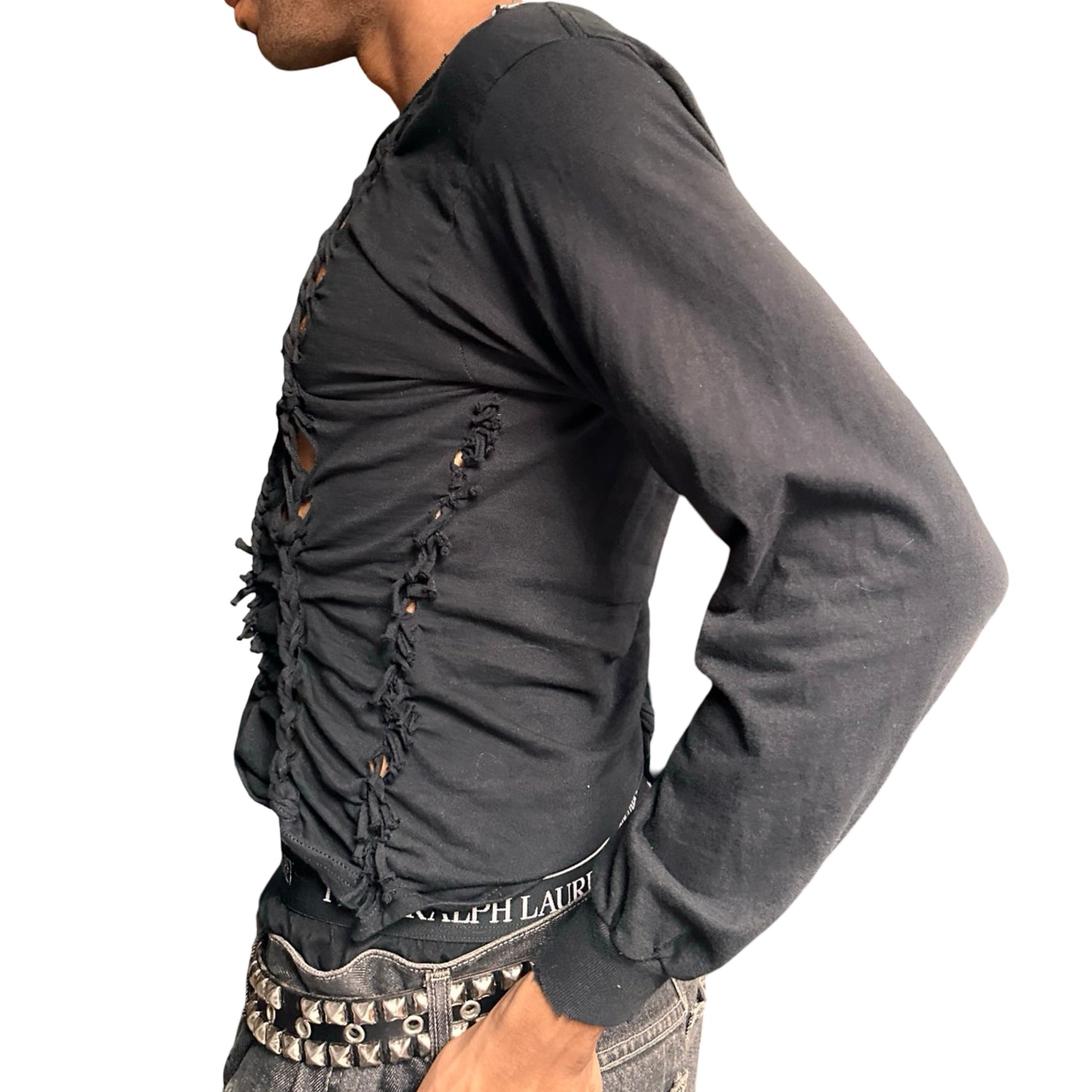left profile of a person wearing a Black long-sleeve shirt with braided front. This top is perfect for festivals and parties