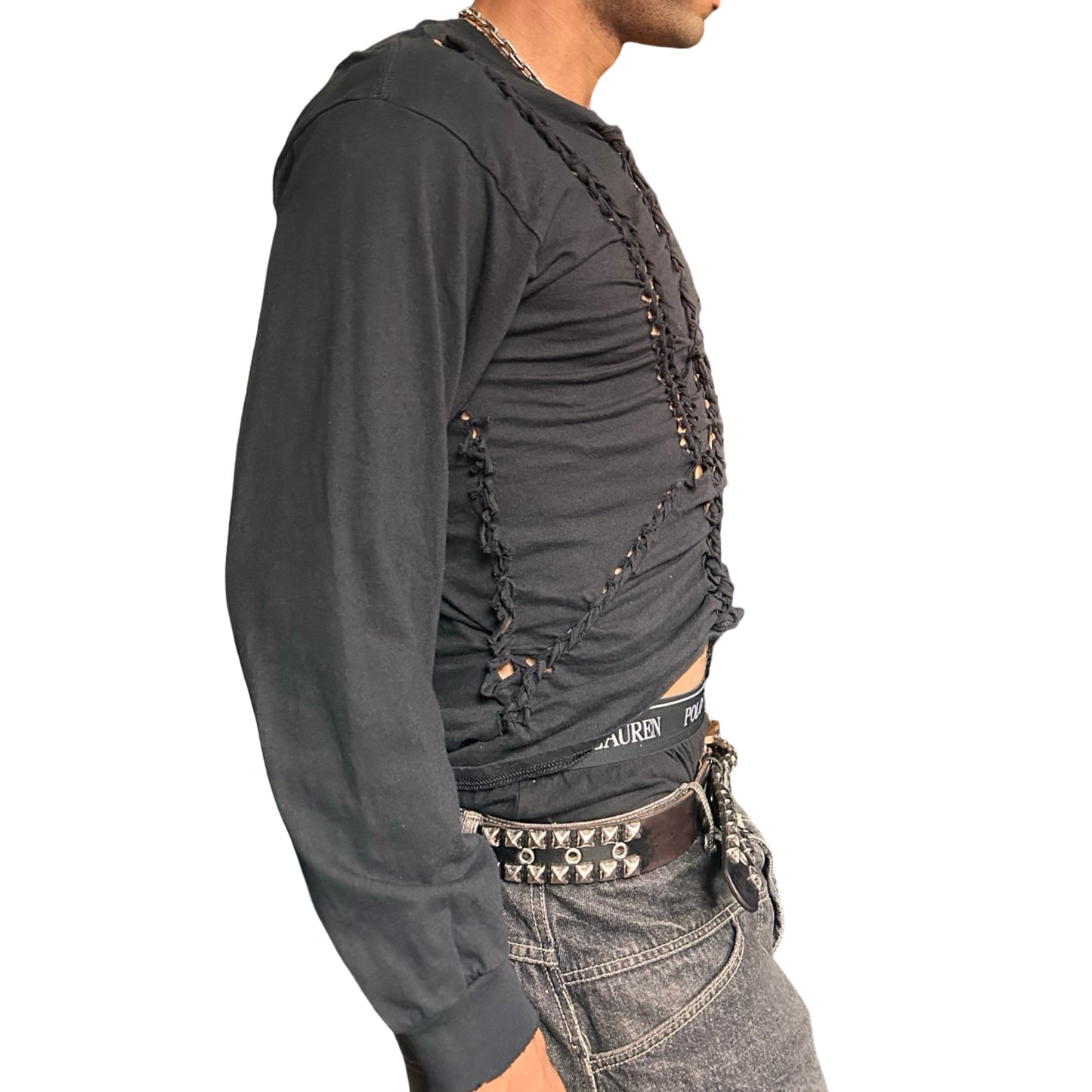Right profile of a person wearing a Black long-sleeve shirt with braided front. This top is perfect for festivals and parties