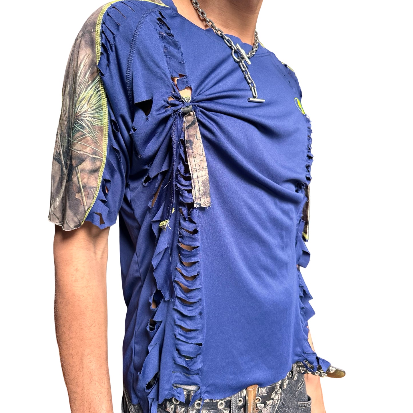 Blue gathered top with realtree sleeves on a white background