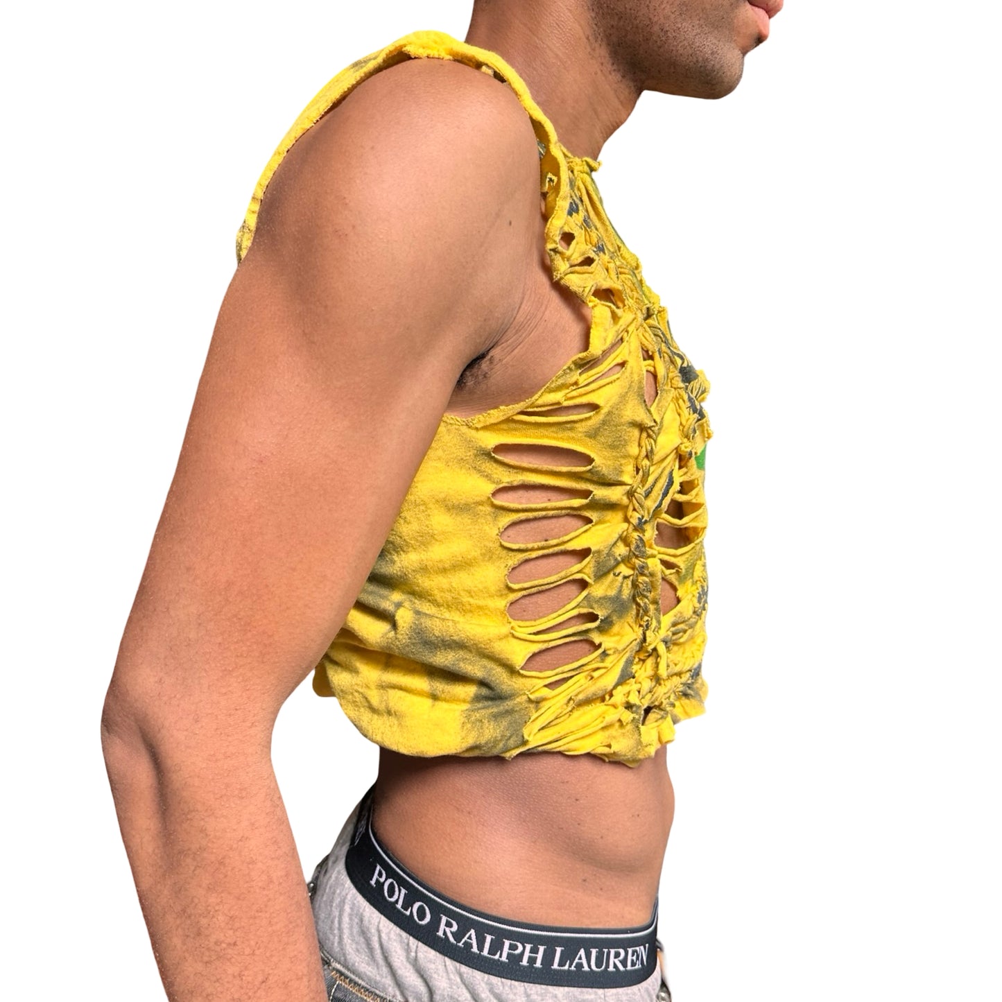Yellow braided tank top worn by a person on a white background