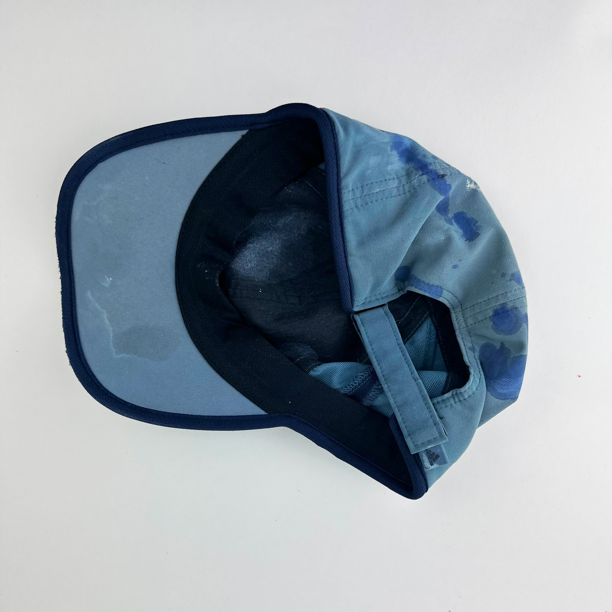ASTROBOI* x Adidas 'Haaland' blue and black painted rhinestone cap, rear view showing adjustable strap back.