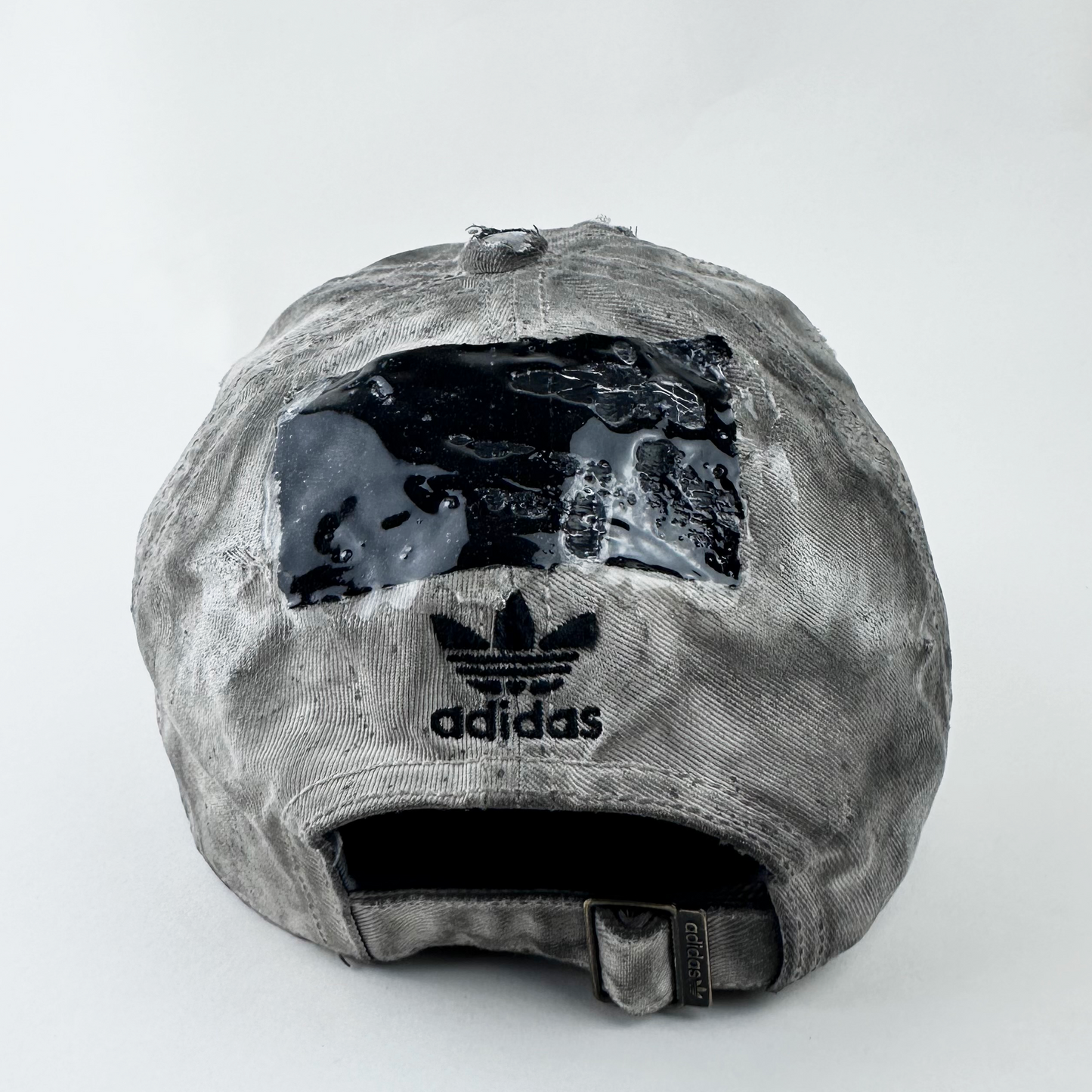ASTROBOI* x Adidas 'H Chic' tan distressed grunge hat, rear view showing black duct tape accent detail and adjustable strap.