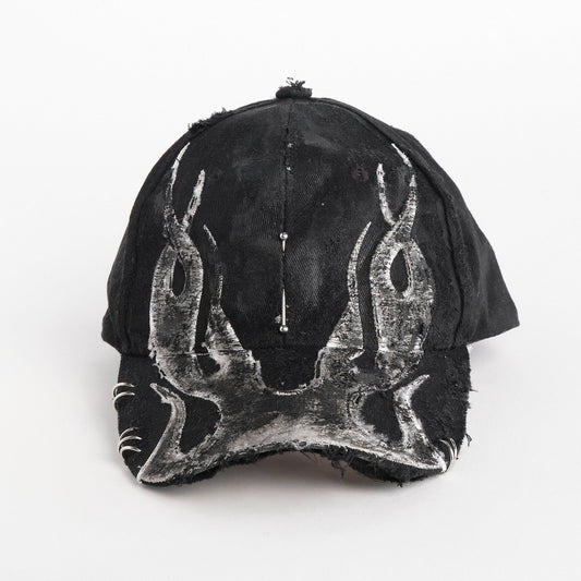 Front of ASTROBOI* 'Black Flame' Y2K Black & Silver Distressed Pierced Hat 