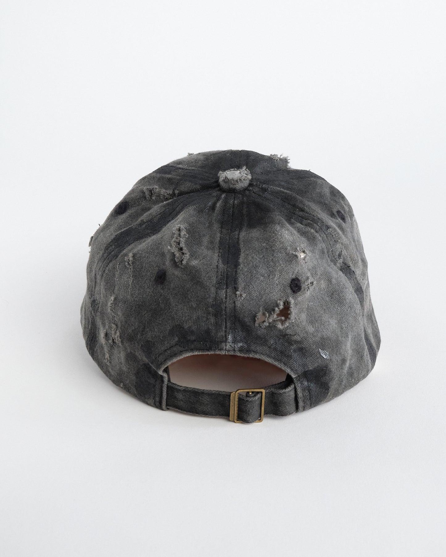 Back of ASTROBOI* indie grunge black distressed hat with barbed wire logo, adjustable strap, and hand-painted raw streetwear detailing, handmade in NYC.