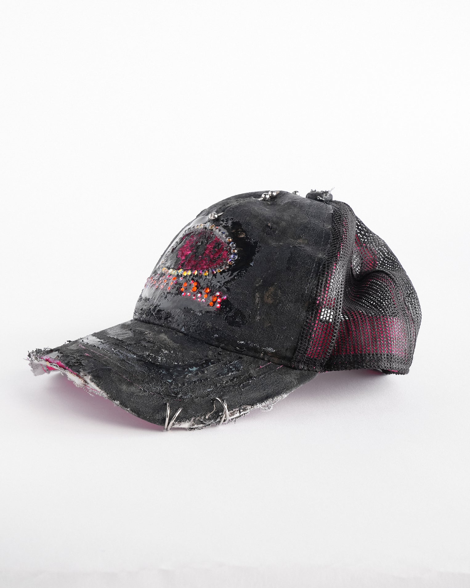 Left of ASTROBOI* x Mossy Oak black and pink distressed rhinestone hat with resin logo and mesh back panel