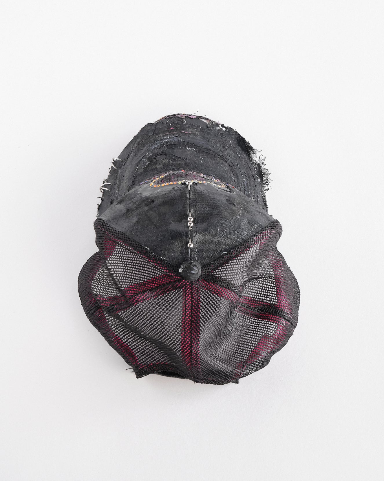 Back top of ASTROBOI* x Mossy Oak black and pink distressed rhinestone hat with resin logo and mesh back panel