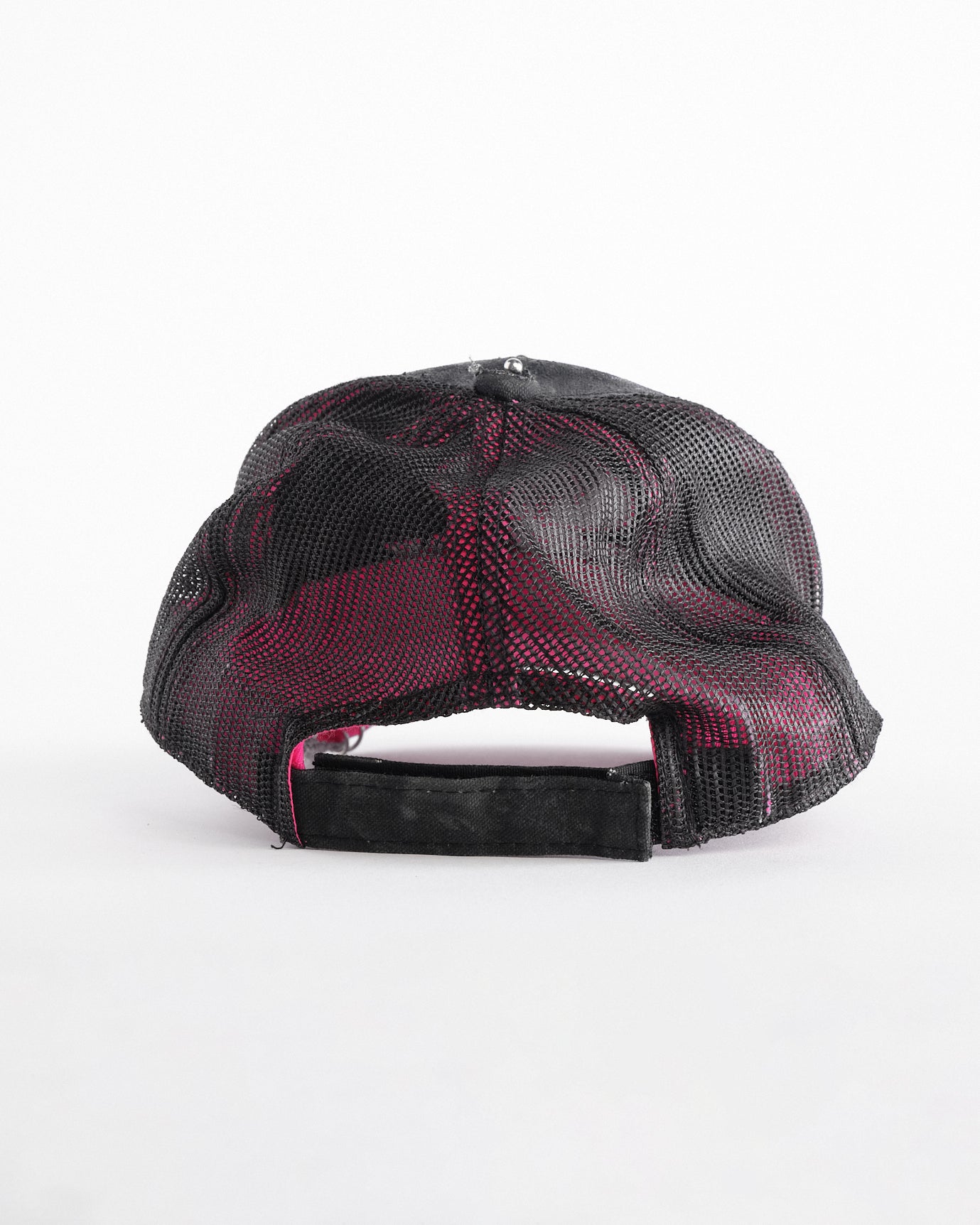 Back of ASTROBOI* x Mossy Oak black and pink distressed rhinestone hat with resin logo and mesh back panel