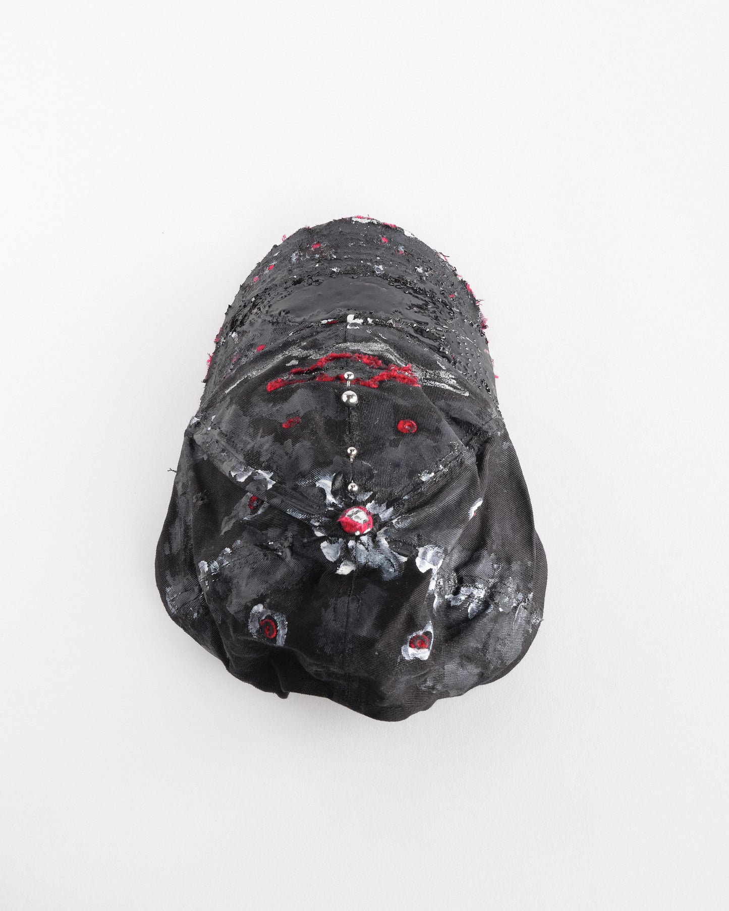 Back top of Black and red Chevy Racing hat customized by ASTROBOI* with distressing, painted details, glossy resin visor, and stainless steel piercings.