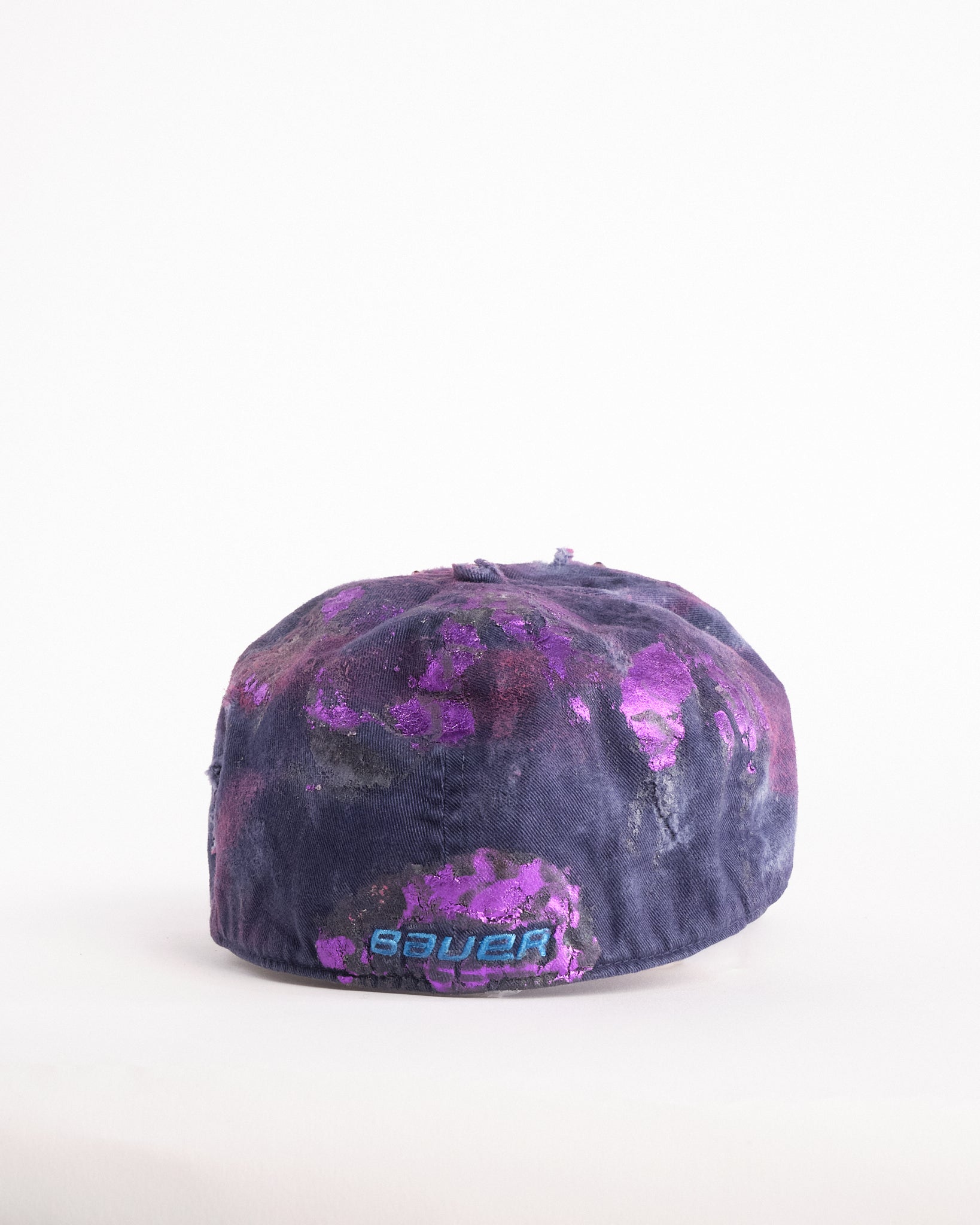 Back of ASTROBOI* x Bauer purple distressed hat with metallic paint detailing, clustered rhinestones, and closed-back fit, handmade and customized in NYC.