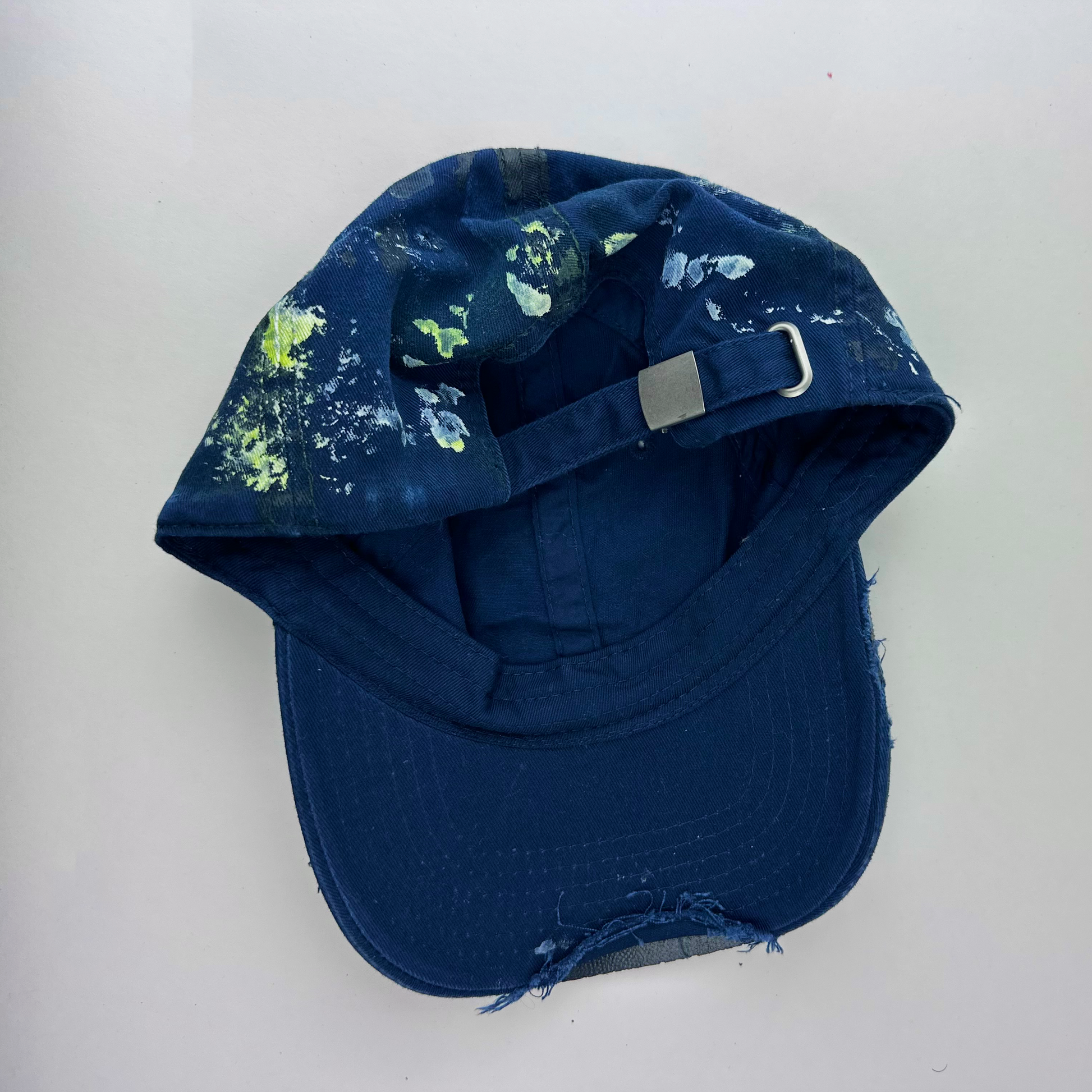ASTROBOI* 'Coral' blue distressed painted cap, rear view showing adjustable strap back.