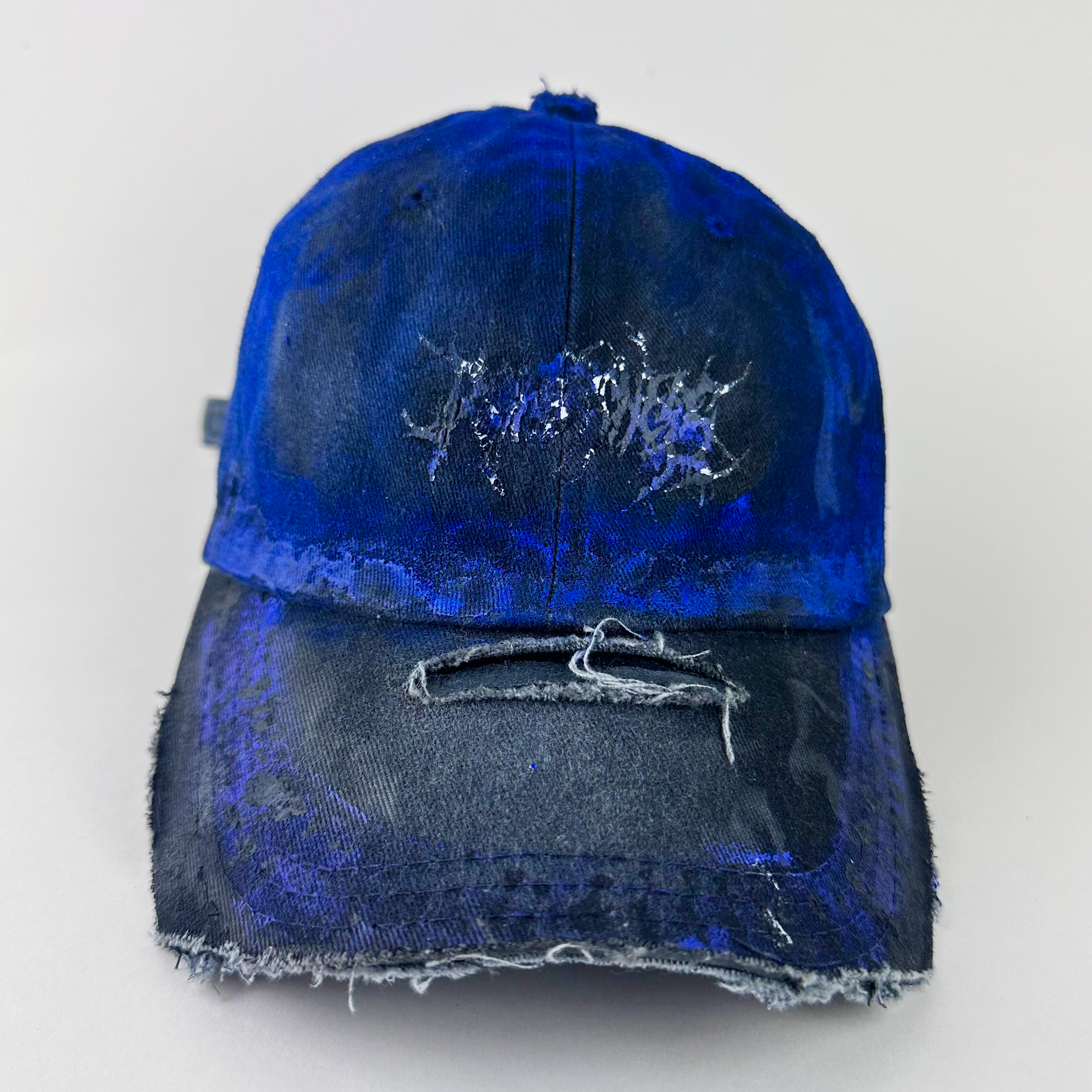 ASTROBOI* 'Damian' gray and black distressed indie hat with indie barbed wire design at front and custom blue haze paint treatment throughout, front view.