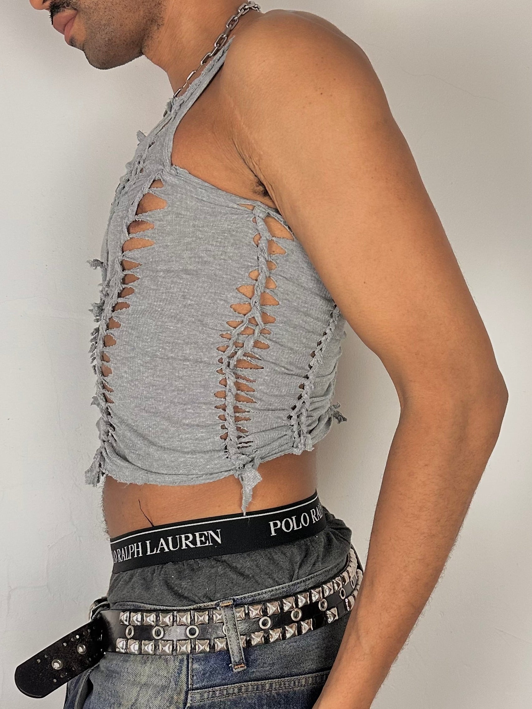 Left side of ASTROBOI* Fog gray braided twist tank top with cut-outs and fringe hem, size Medium, close fit, customized in NYC