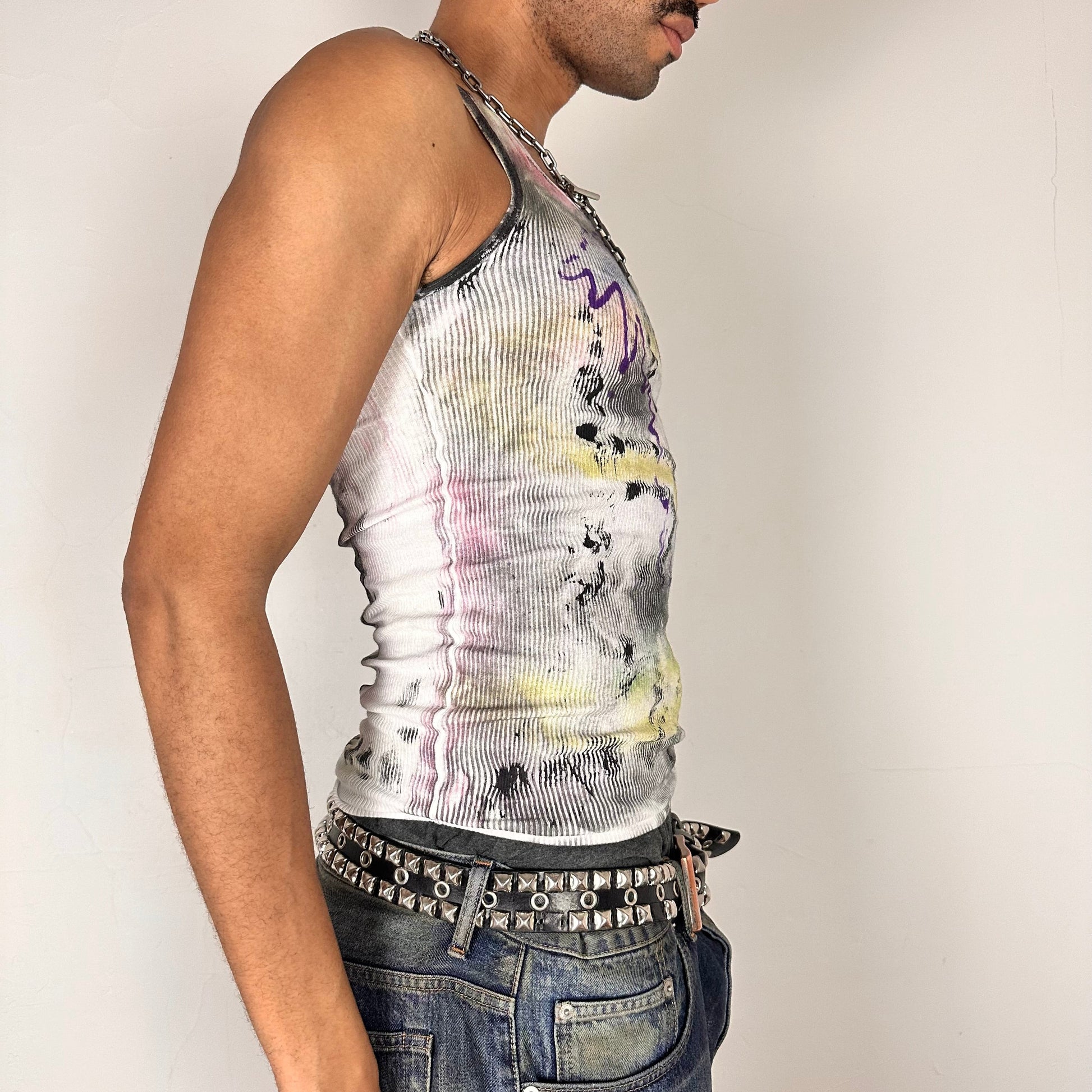 Right side of ASTROBOI* x Hanes 'Plum' white slim-fit tank top with hand-painted multicolor abstract scribble graphic in pink, yellow, blue, and purple, customized at ASTROBOI* STUDIO in NYC.