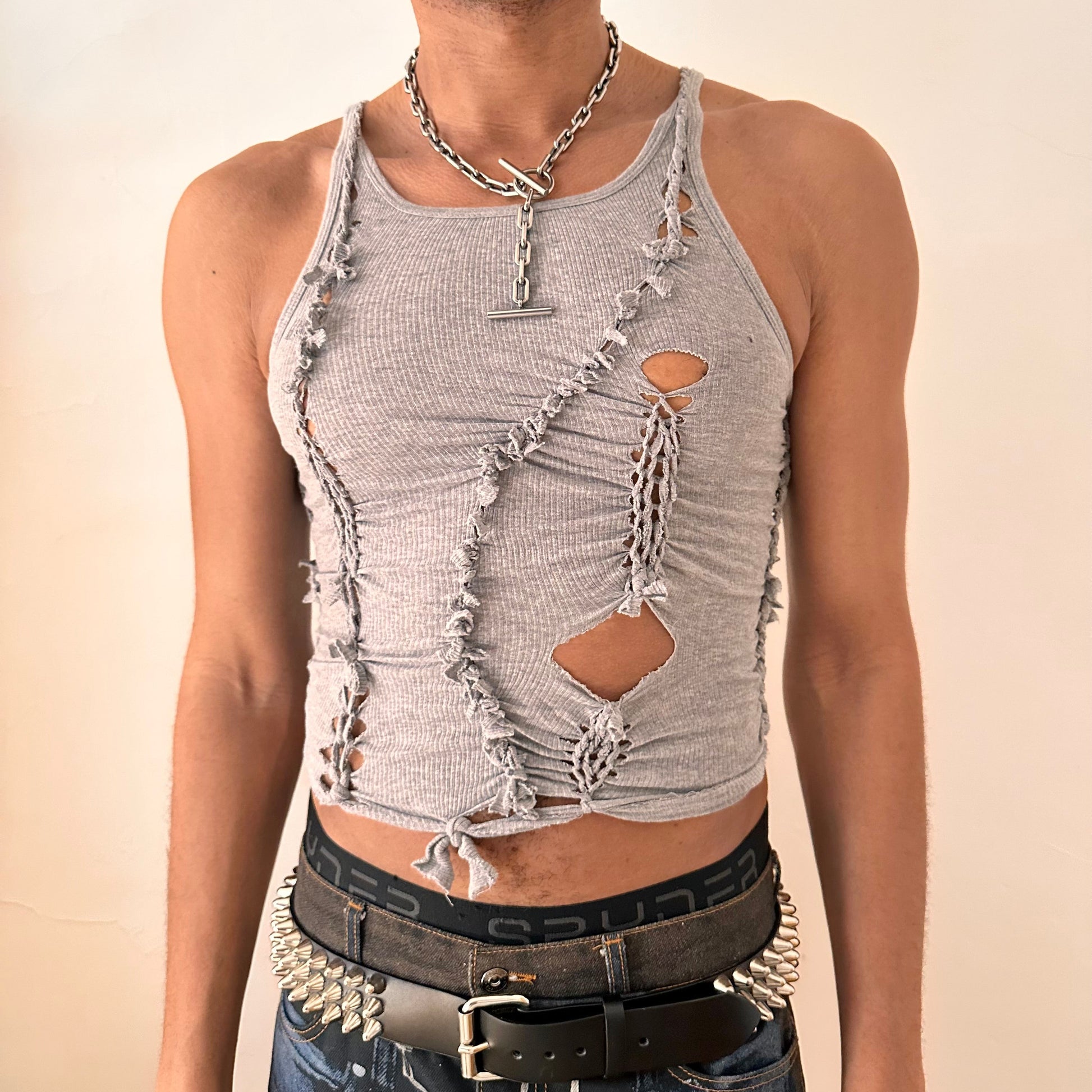 ASTROBOI* 'Ambiguous' gray form-fitting braided twist tank top with hand-braided arrangement and slash detailing throughout, front view.