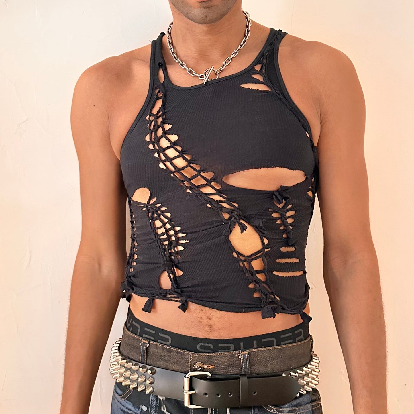 ASTROBOI* x Gildan ‘Nightshade’ black braided twist tank top with slashed detailing and slim cropped fit, front view.