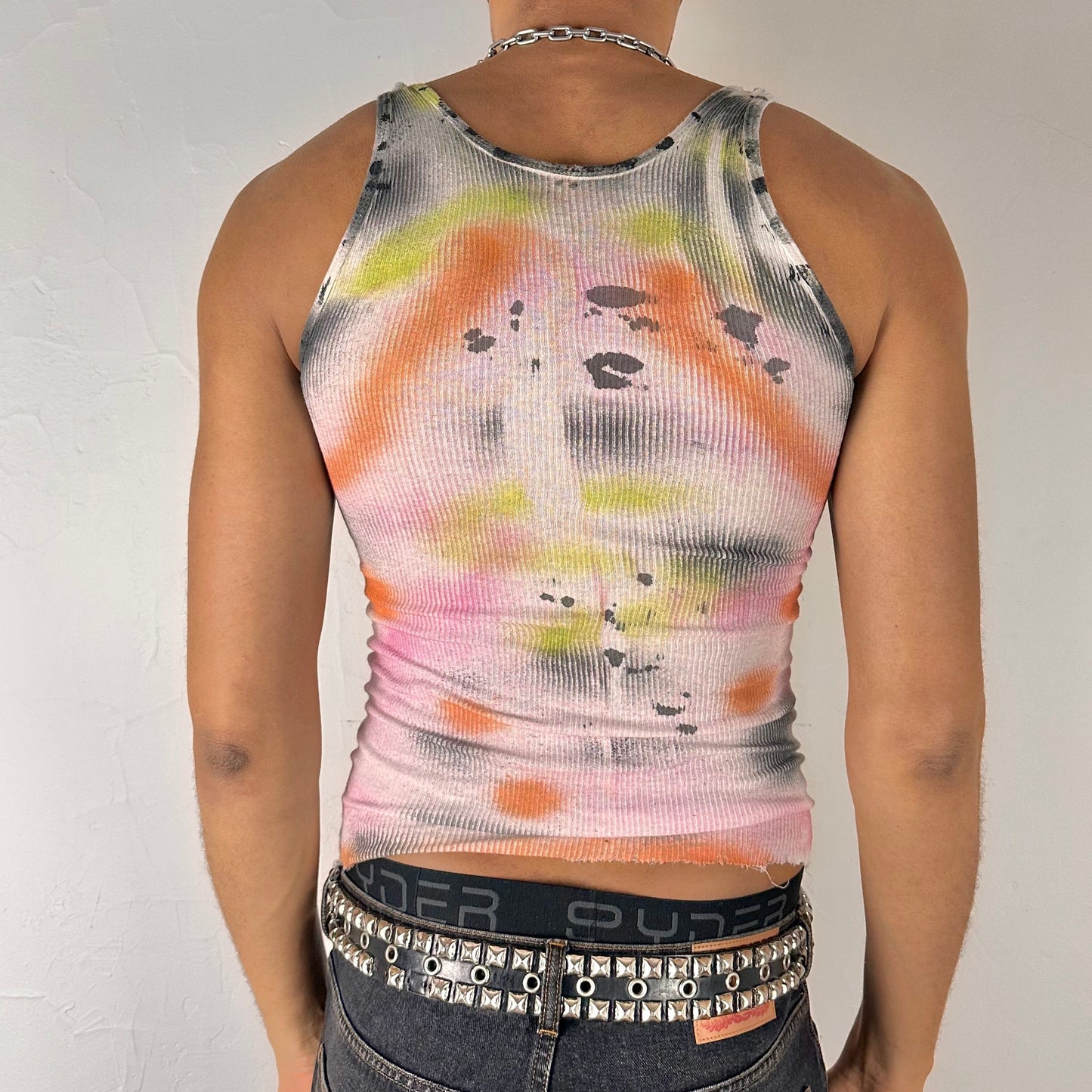 Back of ASTROBOI* x Hanes 'Flowers' white ribbed cotton tank top with hand-painted pink and yellow floral design throughout, customized at ASTROBOI* STUDIO in NYC.