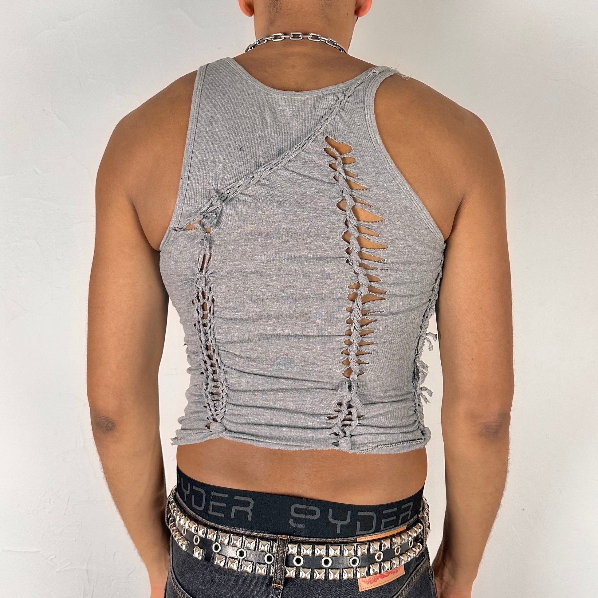 ASTROBOI* 'Concrete' gray braided twist tank top, rear view showing braid, slash, and knot construction, worn by male model.