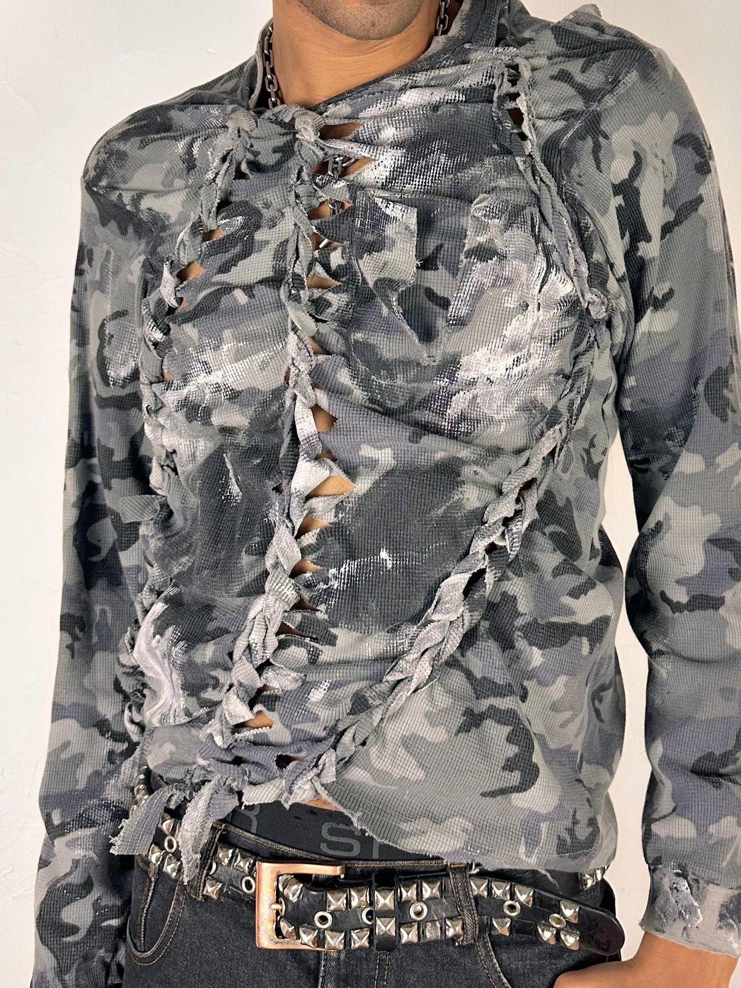 Close up of ASTROBOI* grey camo braided twist long sleeve t-shirt with white and black hand painted design, slim relaxed fit, size XL.