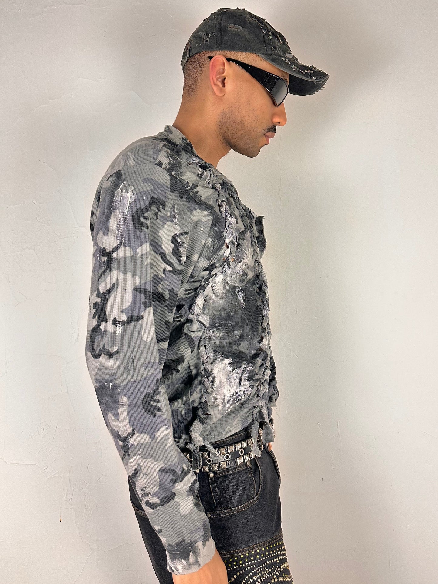 Right side of ASTROBOI* grey camo braided twist long sleeve t-shirt with white and black hand painted design, slim relaxed fit, size XL.