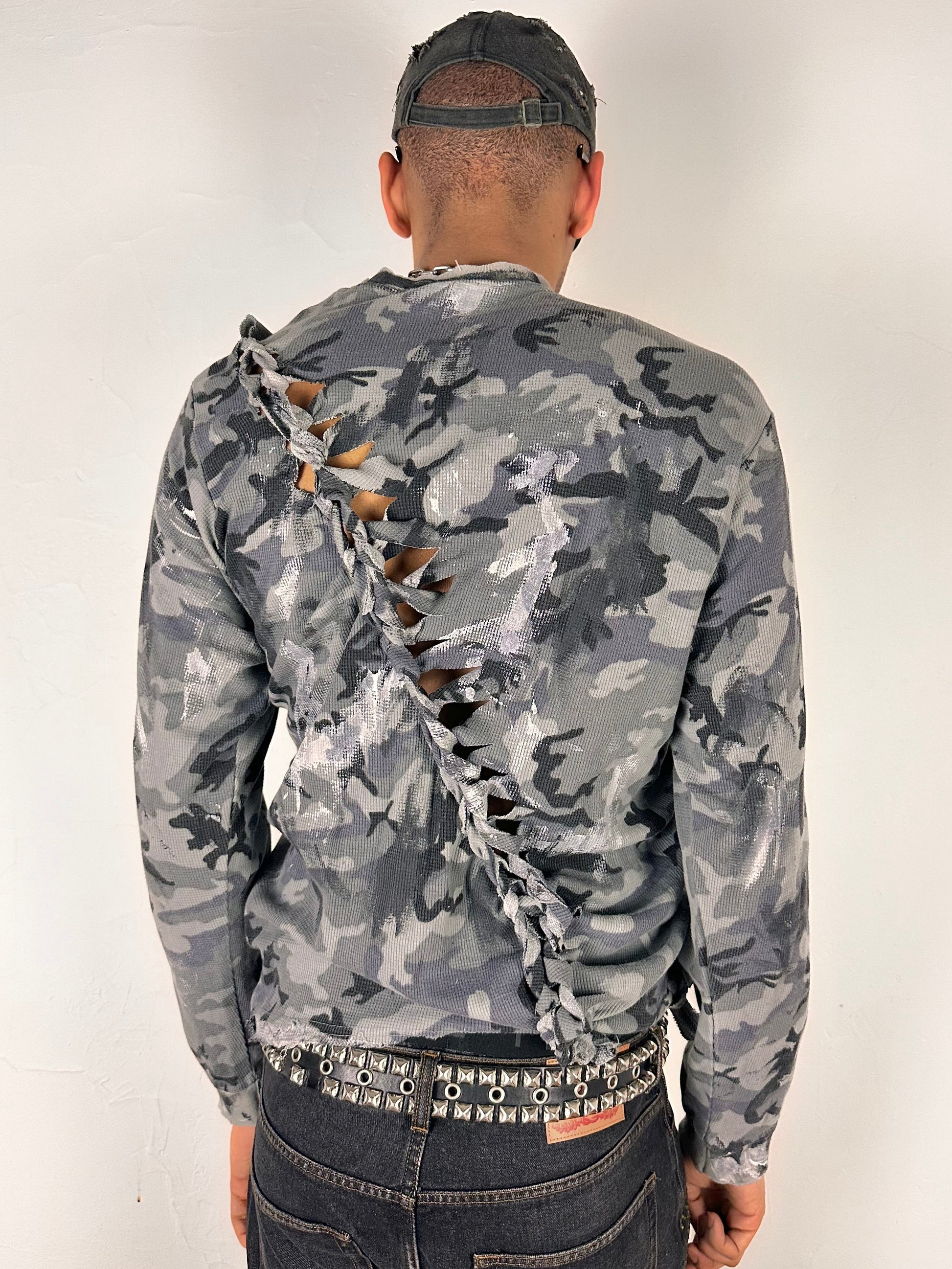 Back of ASTROBOI* grey camo braided twist long sleeve t-shirt with white and black hand painted design, slim relaxed fit, size XL.