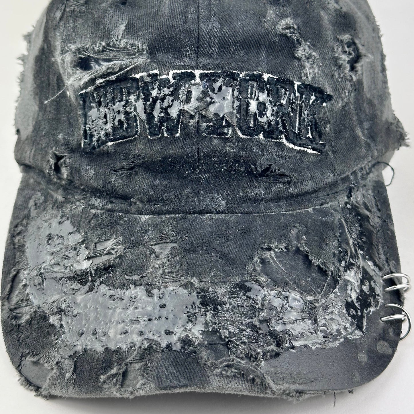 ASTROBOI* 'Orion' New York Black Distressed Resin Pierced Hat