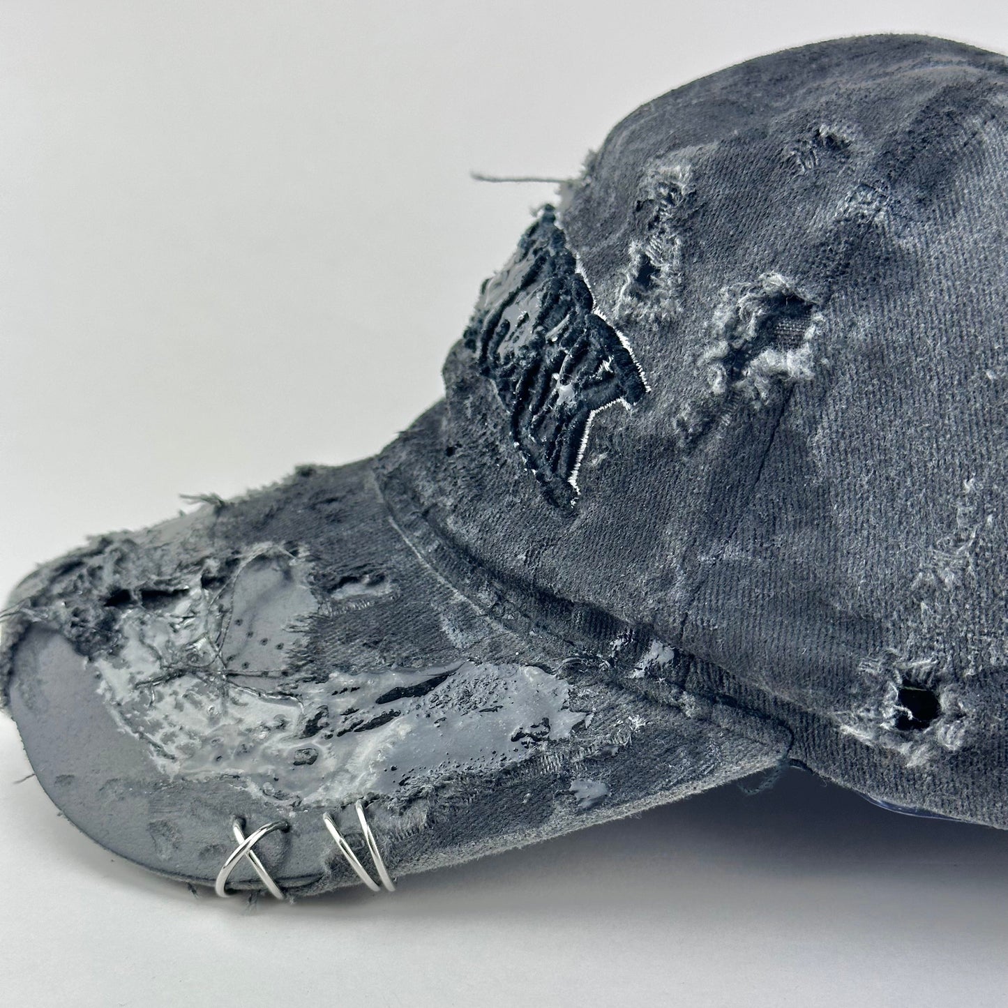 ASTROBOI* 'Orion' New York Black Distressed Resin Pierced Hat