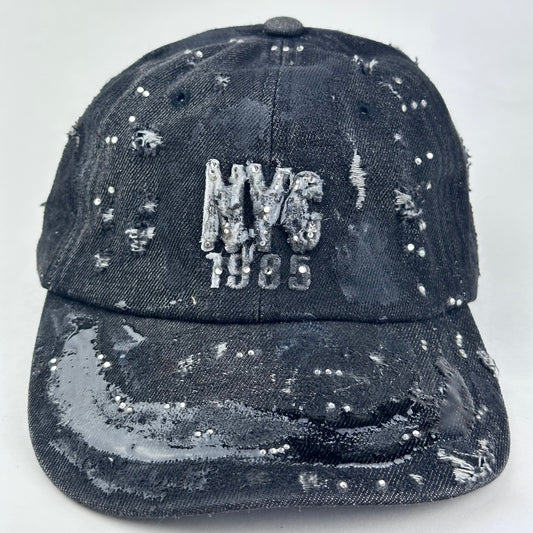 Close up of New York Black Distressed Denim Resin & Rhinestone Hat