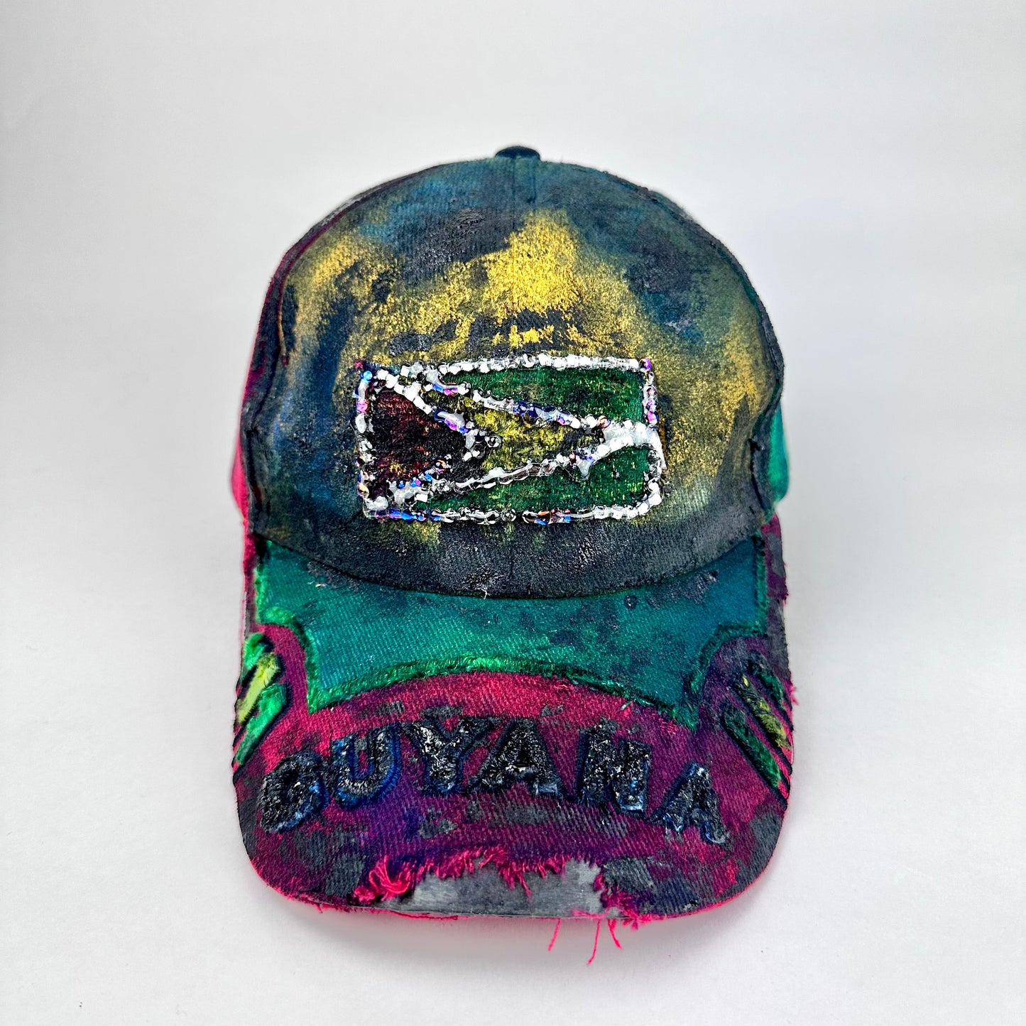 Front 2 product shot of ASTROBOI* Guyana yellow red green distressed baseball hat with resin-sealed rhinestone logo patch and adjustable strap, hand-customized in NYC