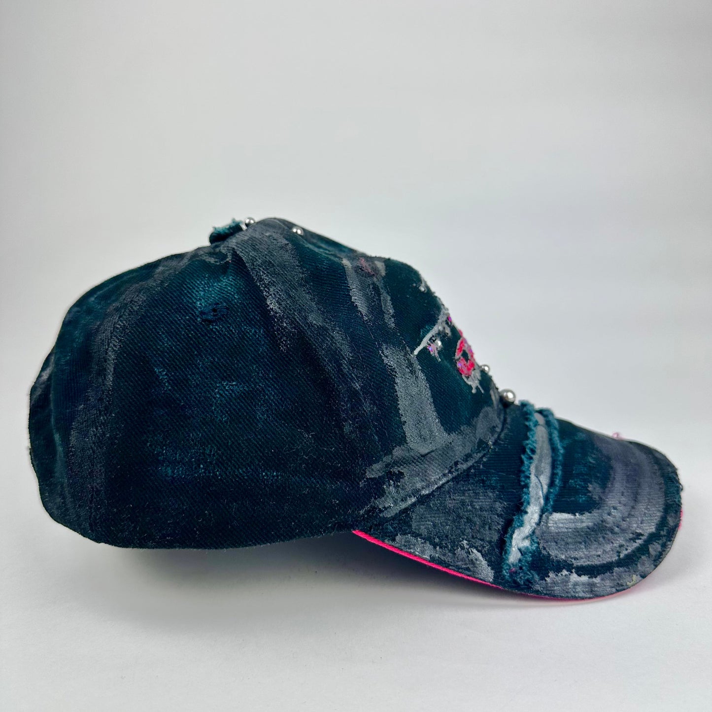 Right side cover shot of ASTROBOI* C5M Super Galaxy black baseball cap with resin-sealed rhinestone logo patch and adjustable strap, hand-customized in NYC