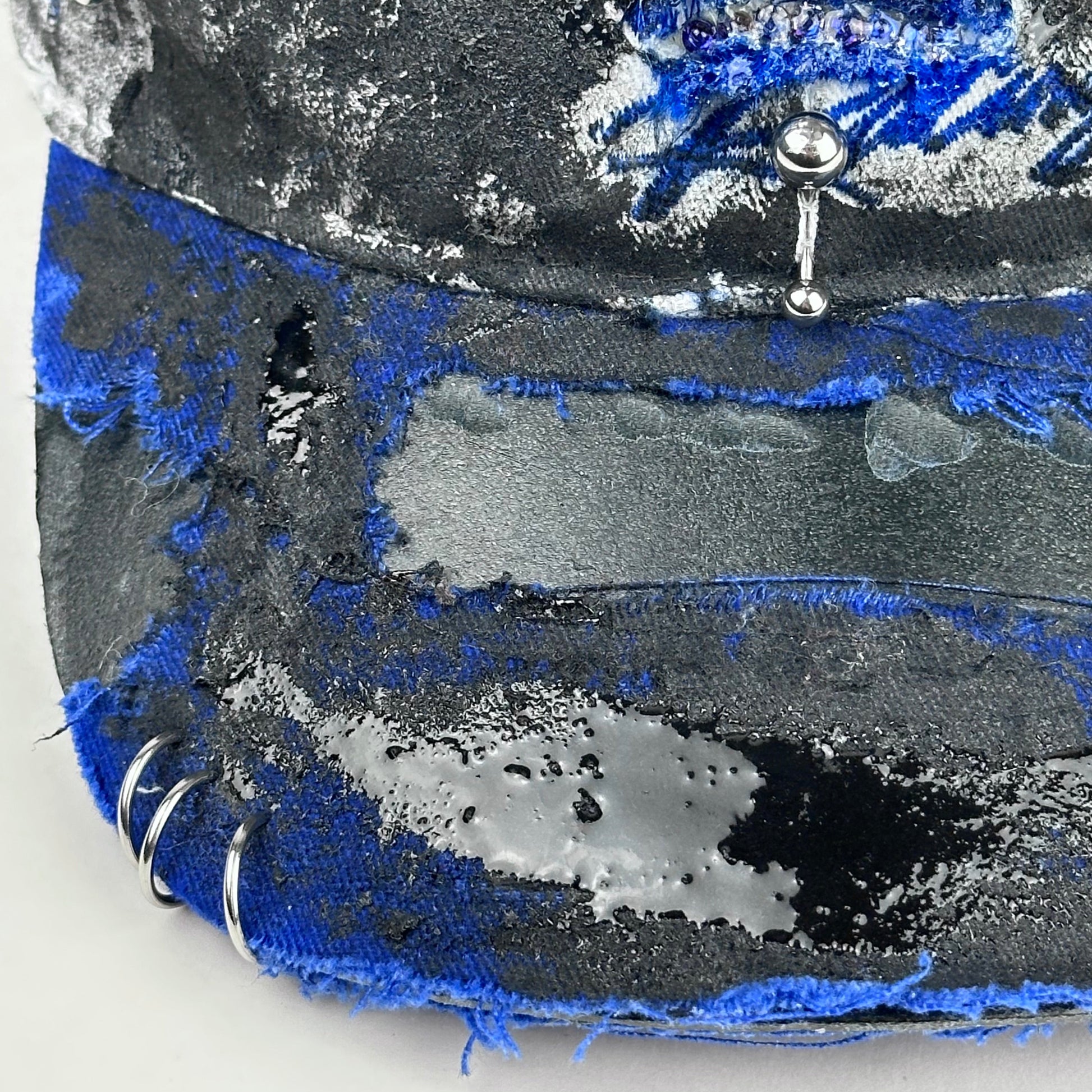 Left of visor piercing detail 
