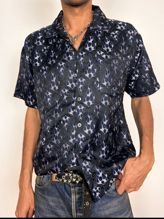 Front of Vintage ODO Y2K blue flame button-up shirt with silver and blue flame graphics and boxy fit