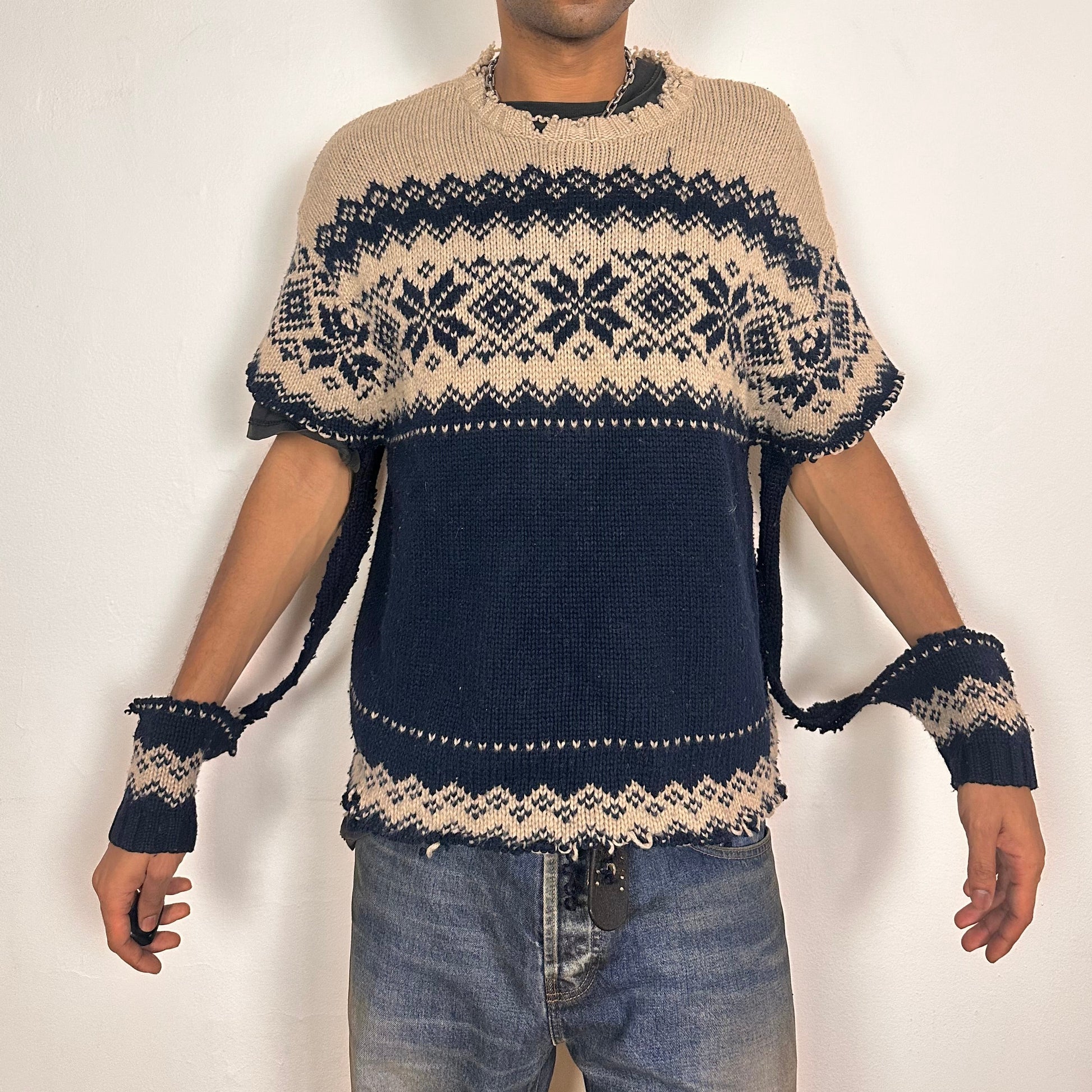 Cover of Deconstructed Fair Isle grunge sweater in XL with boxy fit, cutout sleeves, and raw hem, handmade by ASTROBOI* STUDIO in NYC.
